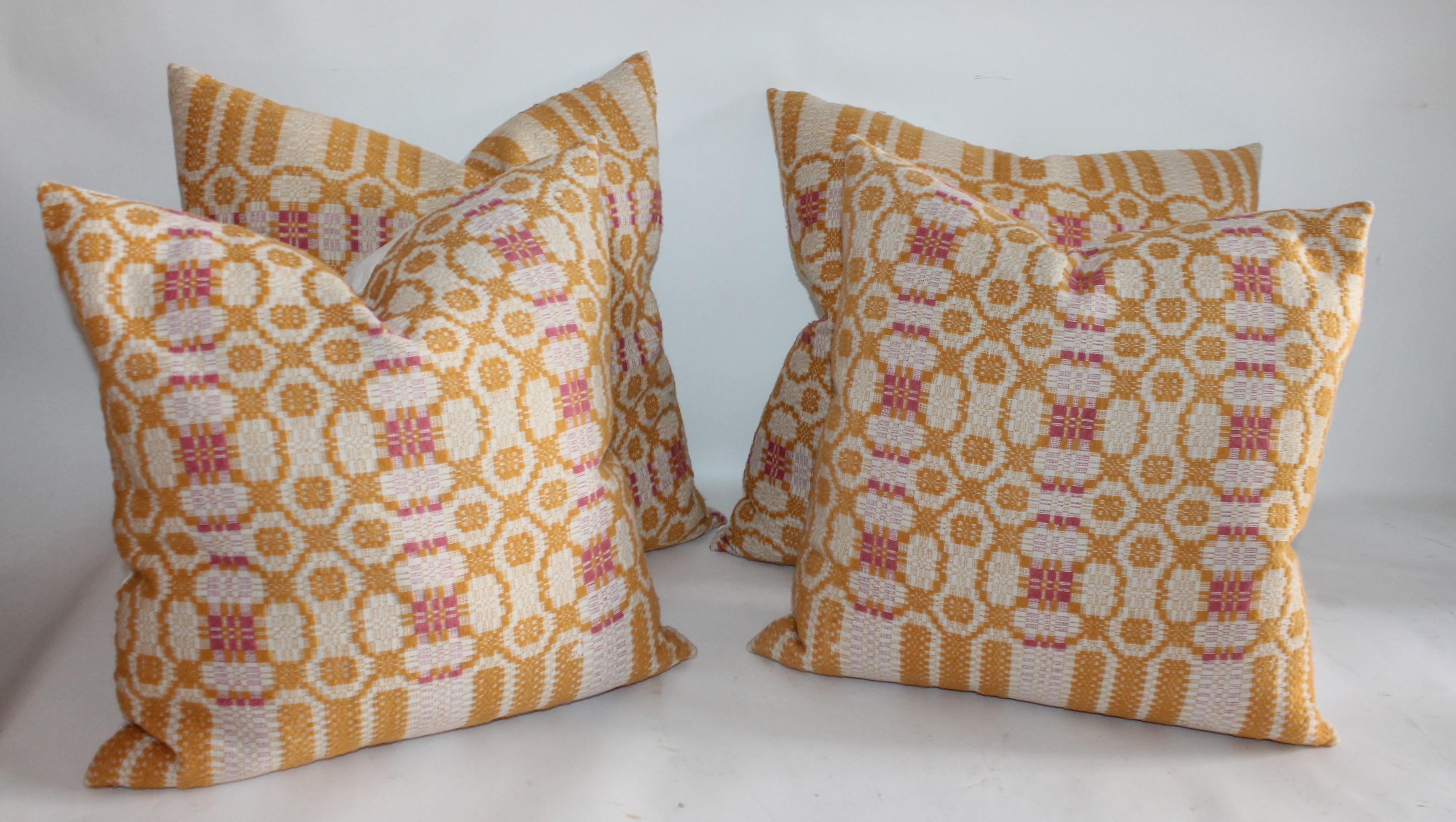 These two pairs of golden mustard & salmon hand woven jacquard coverlet pillows have white cotton linen backings. All in great condition. Down & feather fill.
Measures: 22 x 22 pair
18 x 18 pair.