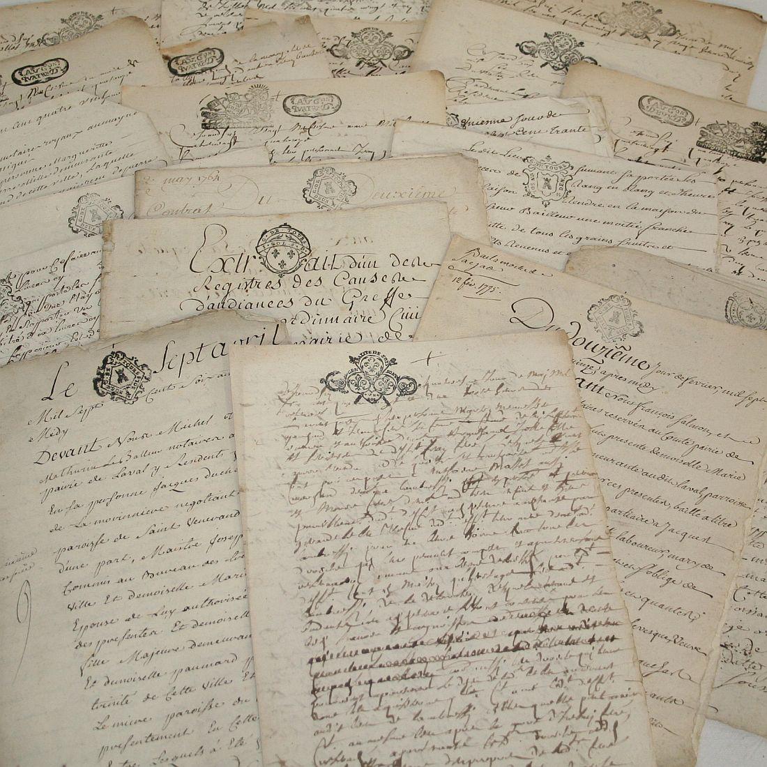 Bundle of 20 extremely old handwritings on paper, France 17th-18th century. Weathered.
