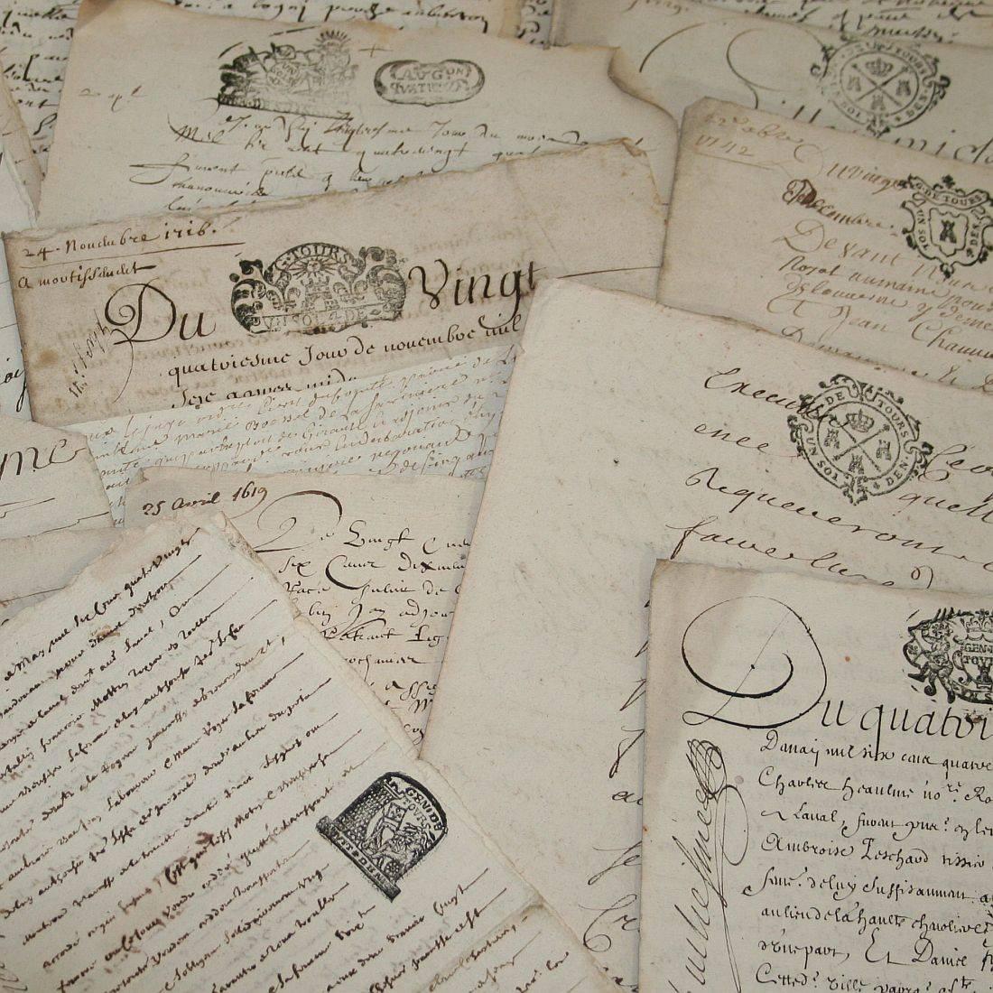 Bundle of 20 extremely old handwritings on paper, France, circa 1650-1800. Weathered.