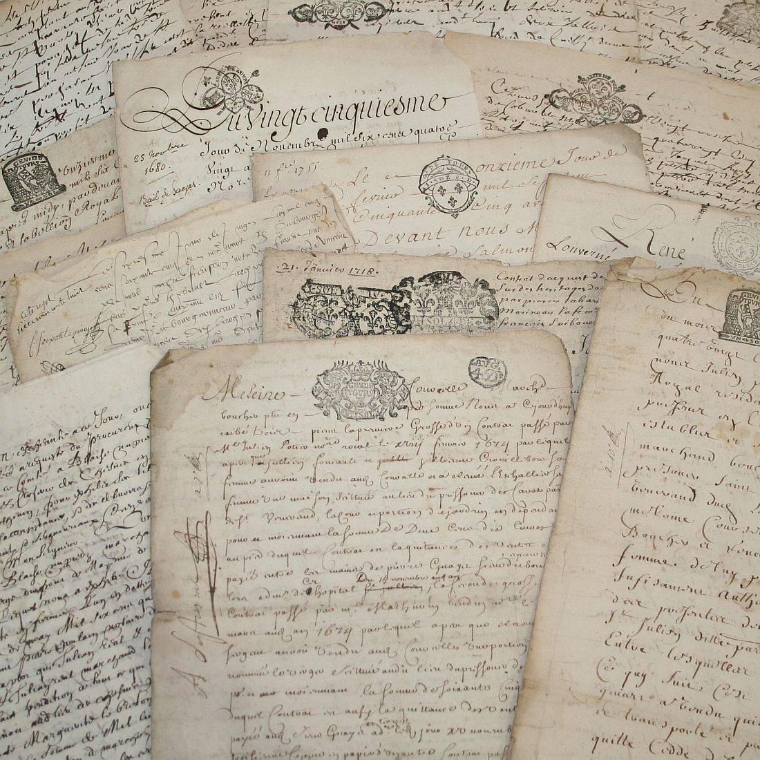 Bundle of 20 extremely old handwritings on paper. 
France, circa 1650-1800. Weathered.