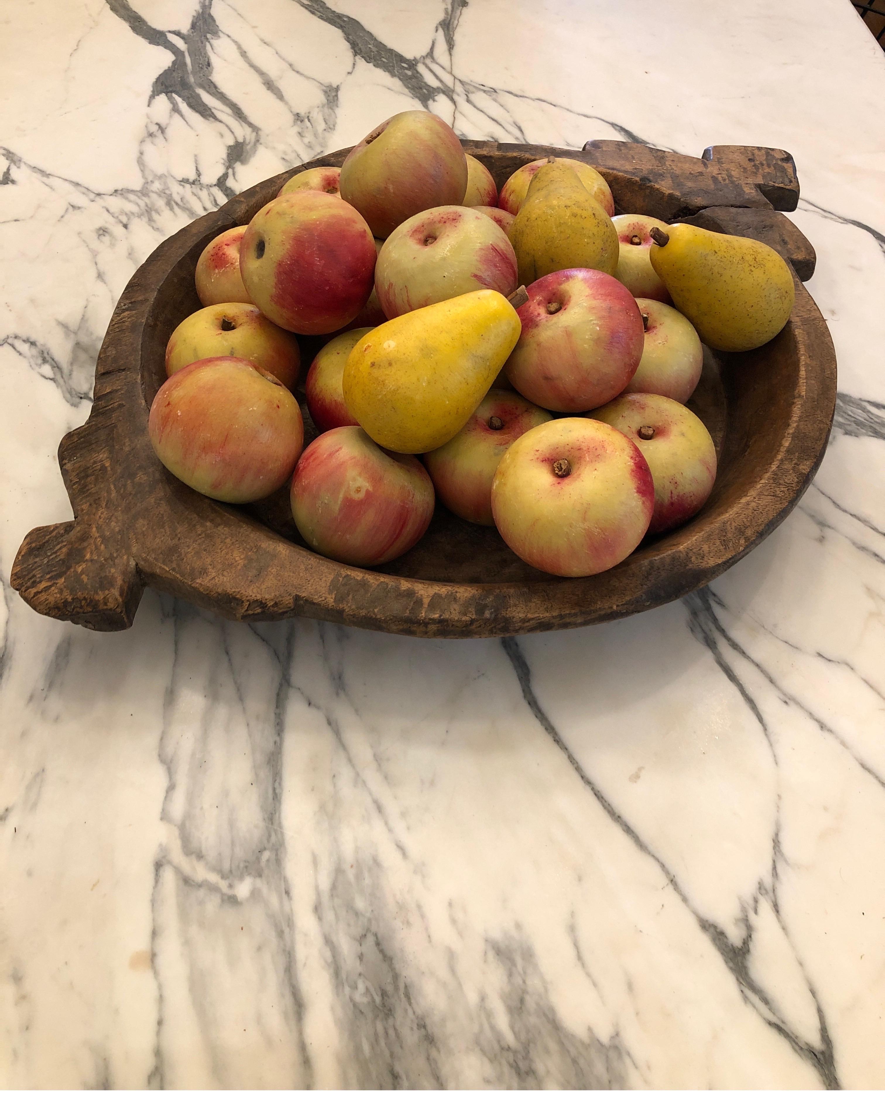 Wonderful collection of 23 hand painted life size Alabaster apples and pears. 20 apples and 3 pears. Each one is unique with very real natural colors and overall good used condition.
Included is a primitive wooden dough bowl that measures 24