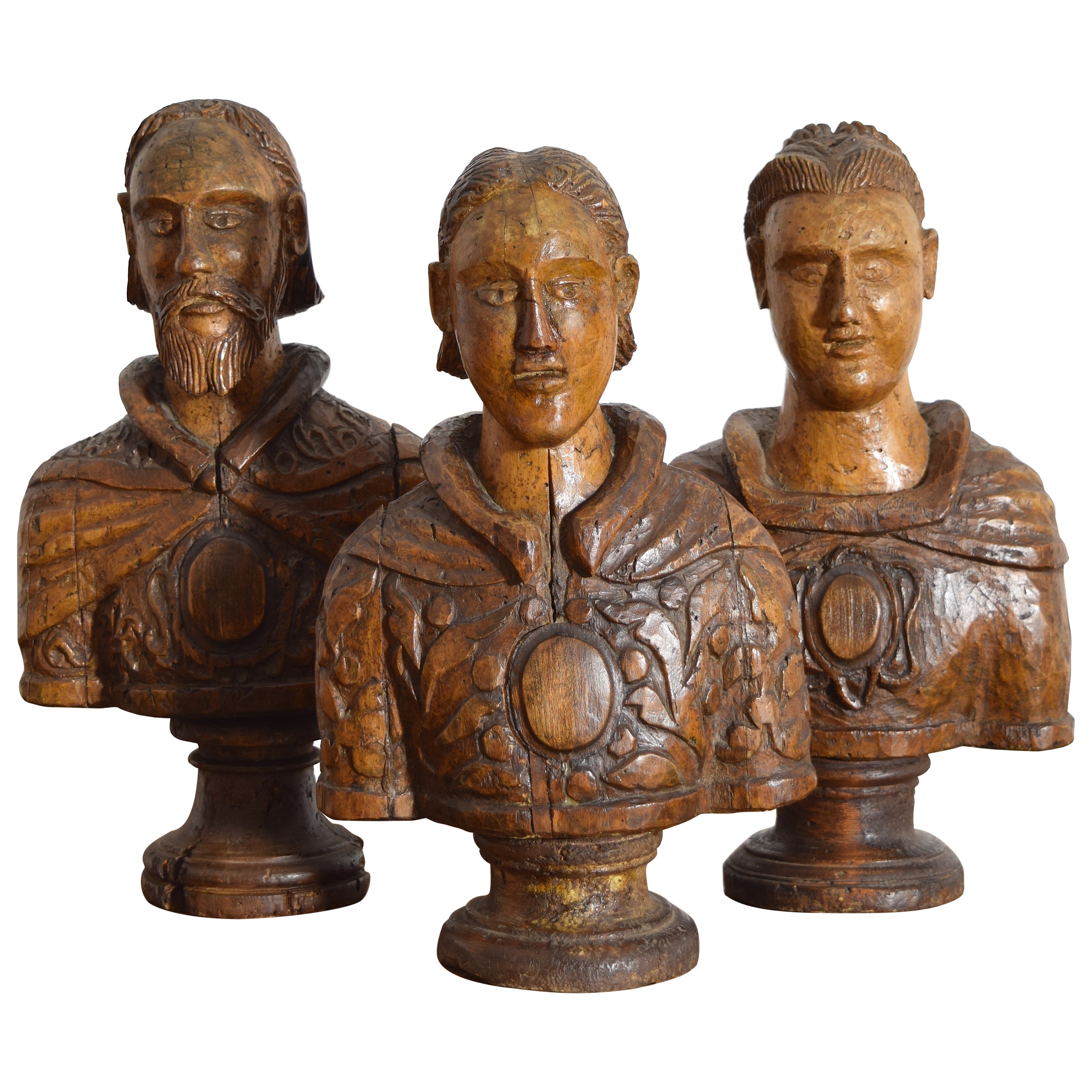 Collection'S di 3 busti italiani in legno di noce intagliato dell'inizio del XVIII secolo in vendita