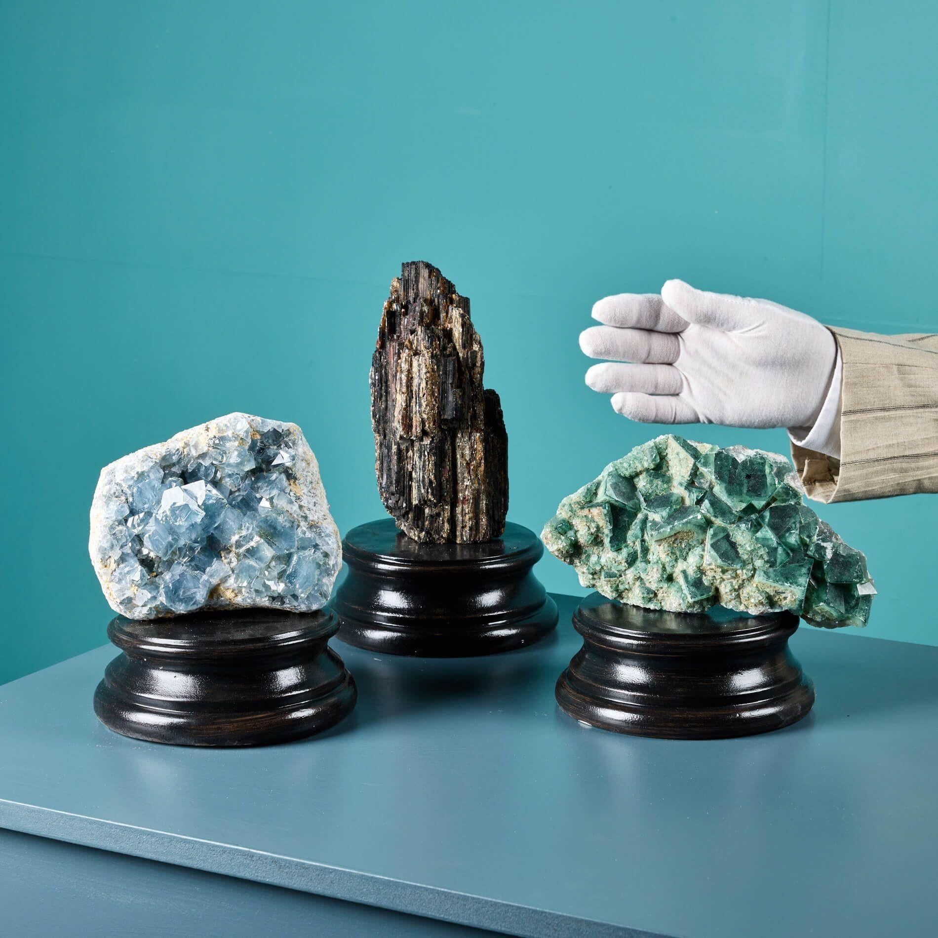 A varied and impressive collection of 3 natural mineral specimens, each presented on an exclusive medium neoclassical style plaster plinth.

Featuring a Celestite, tourmaline and Madagascan green fluorite, each impressive cabinet specimen in this