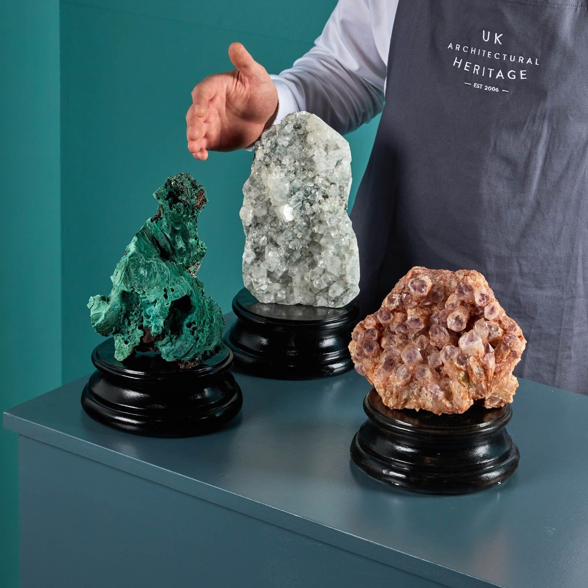 A fascinating collection of 3 natural mineral specimens.

Each presented on an exclusive small painted display plinth, this group contains a range of impressive cabinet specimens.

The collection includes a vibrant green etched malachite specimen, a