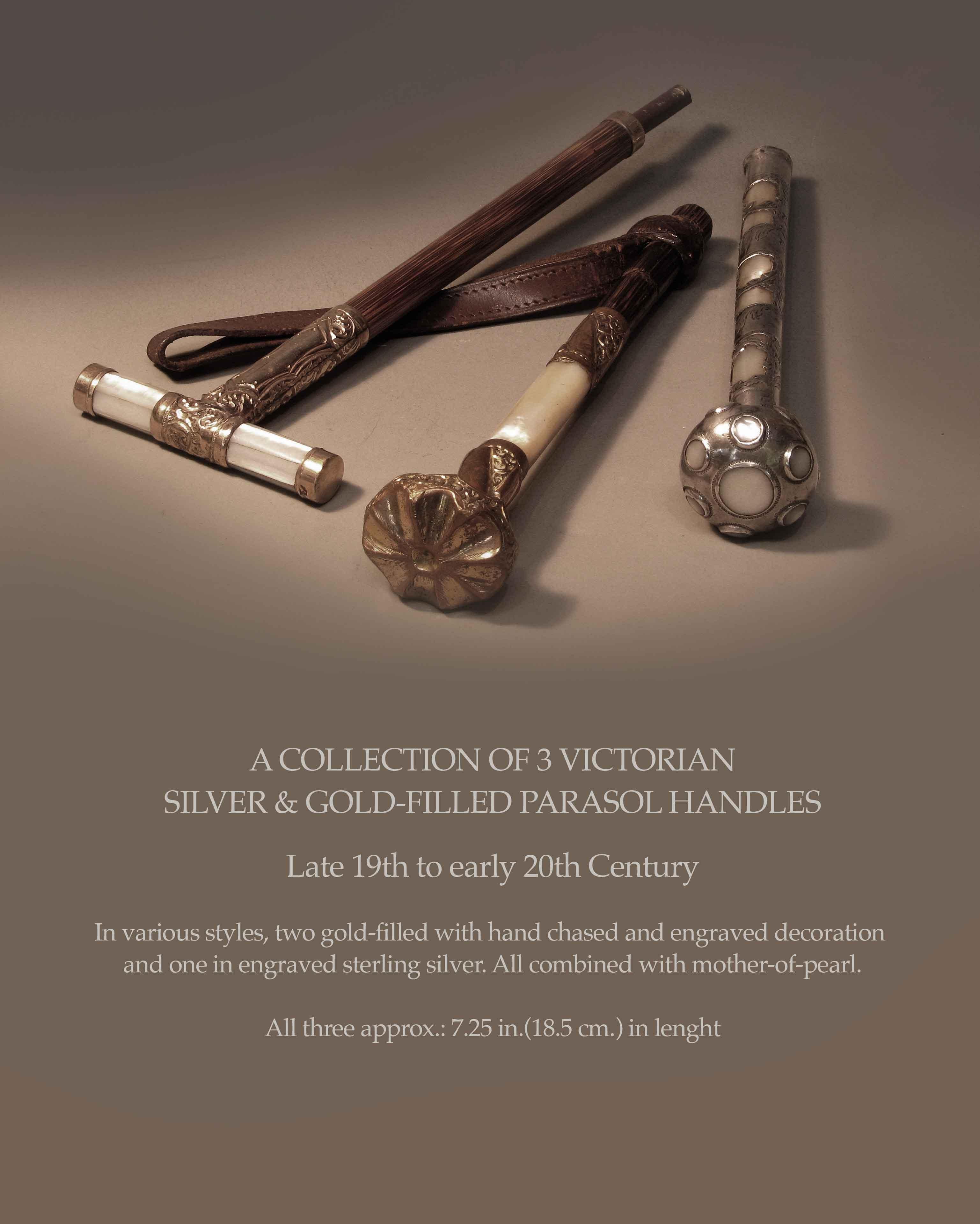A COLLECTION OF 3 VICTORIAN
SILVER & GOLD-FILLED PARASOL HANDLES

Late 19th to early 20th Century.

In various styles, two gold-filled with hand chased and engraved decoration
and one in engraved sterling silver. 
All combined with