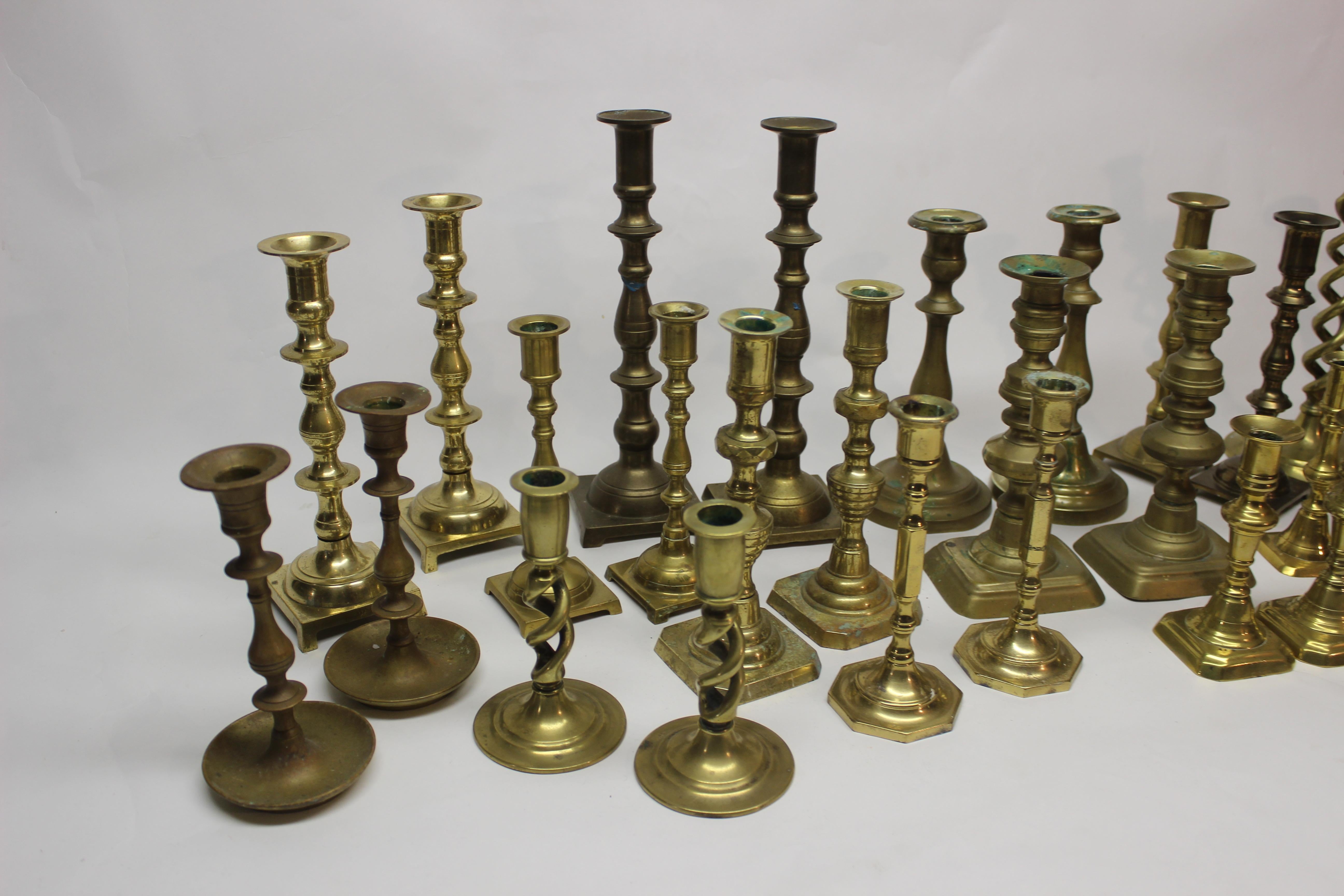 Collection of 32 Vintage and Antique Brass Candlesticks In Good Condition In East Hampton, NY