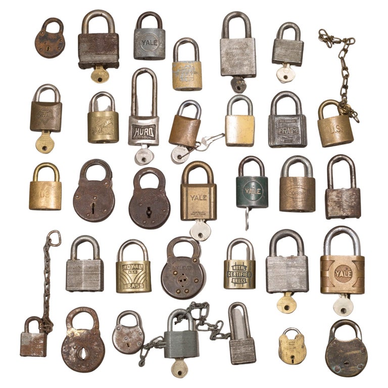 Collection of 33 Antique Bronze and Brass Padlocks C.19101940 For Sale