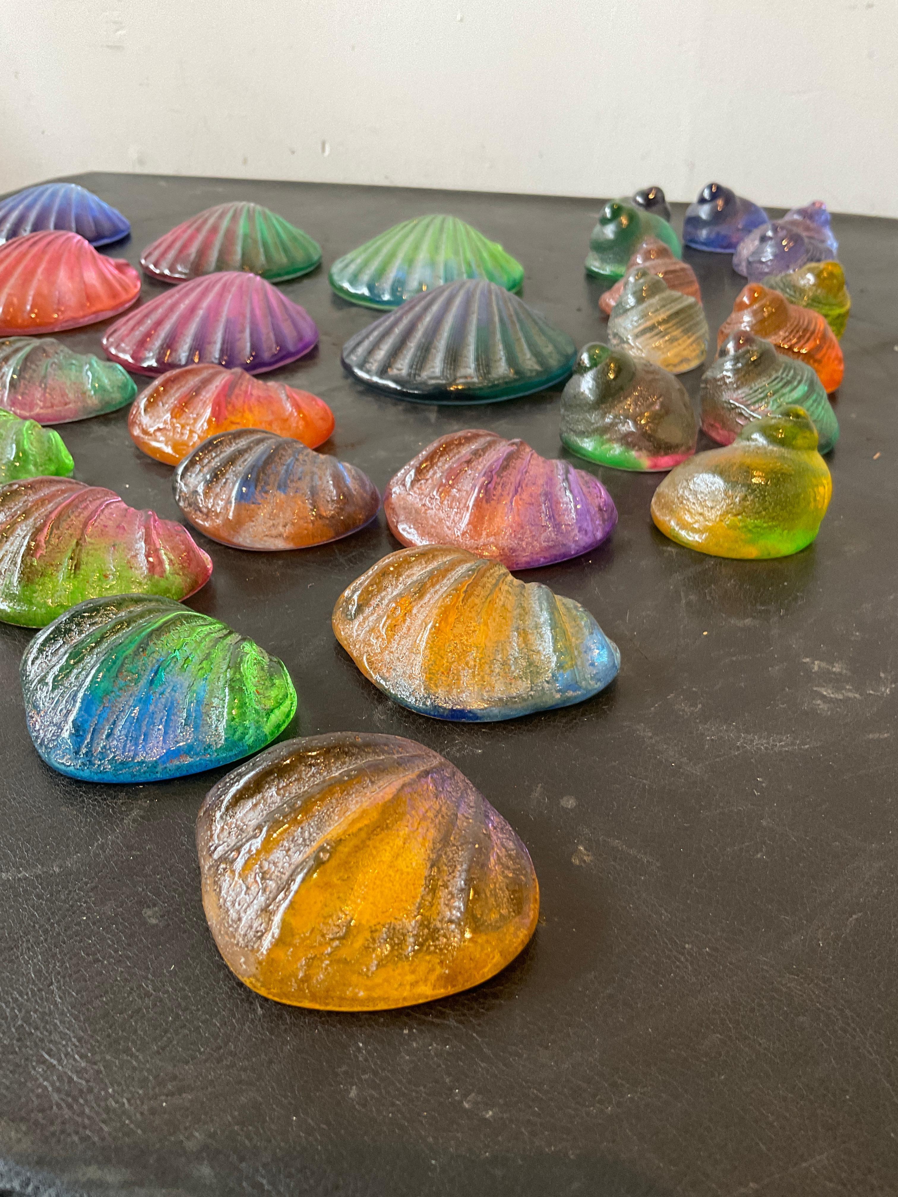 34 iridescent colored glass shells.