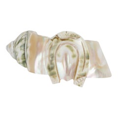 Collection of 4 1890s Carved Conch Napkin Rings