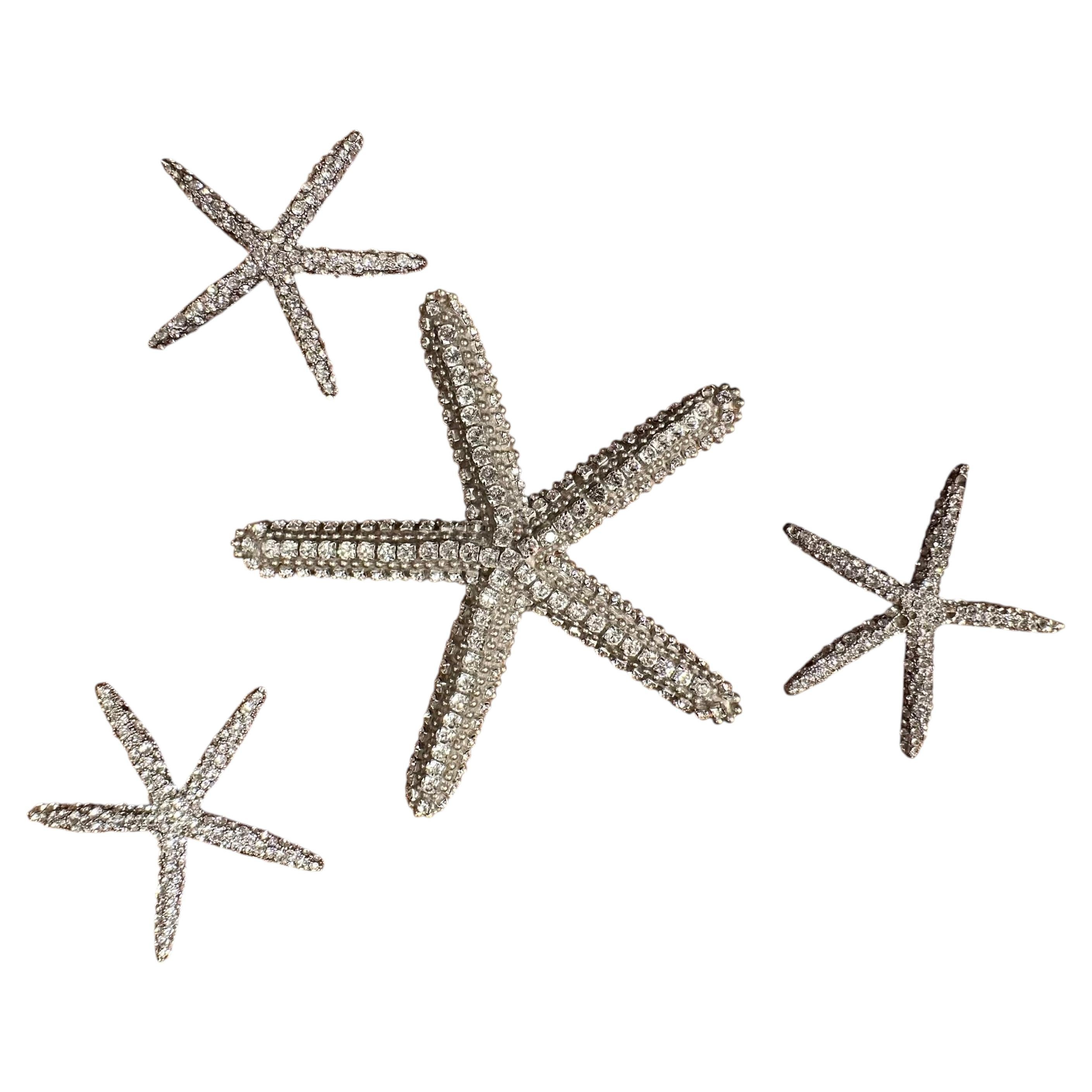 Collection of 4 Bejeweled Swarovski Crystal Starfish by Douglas Cloutier
