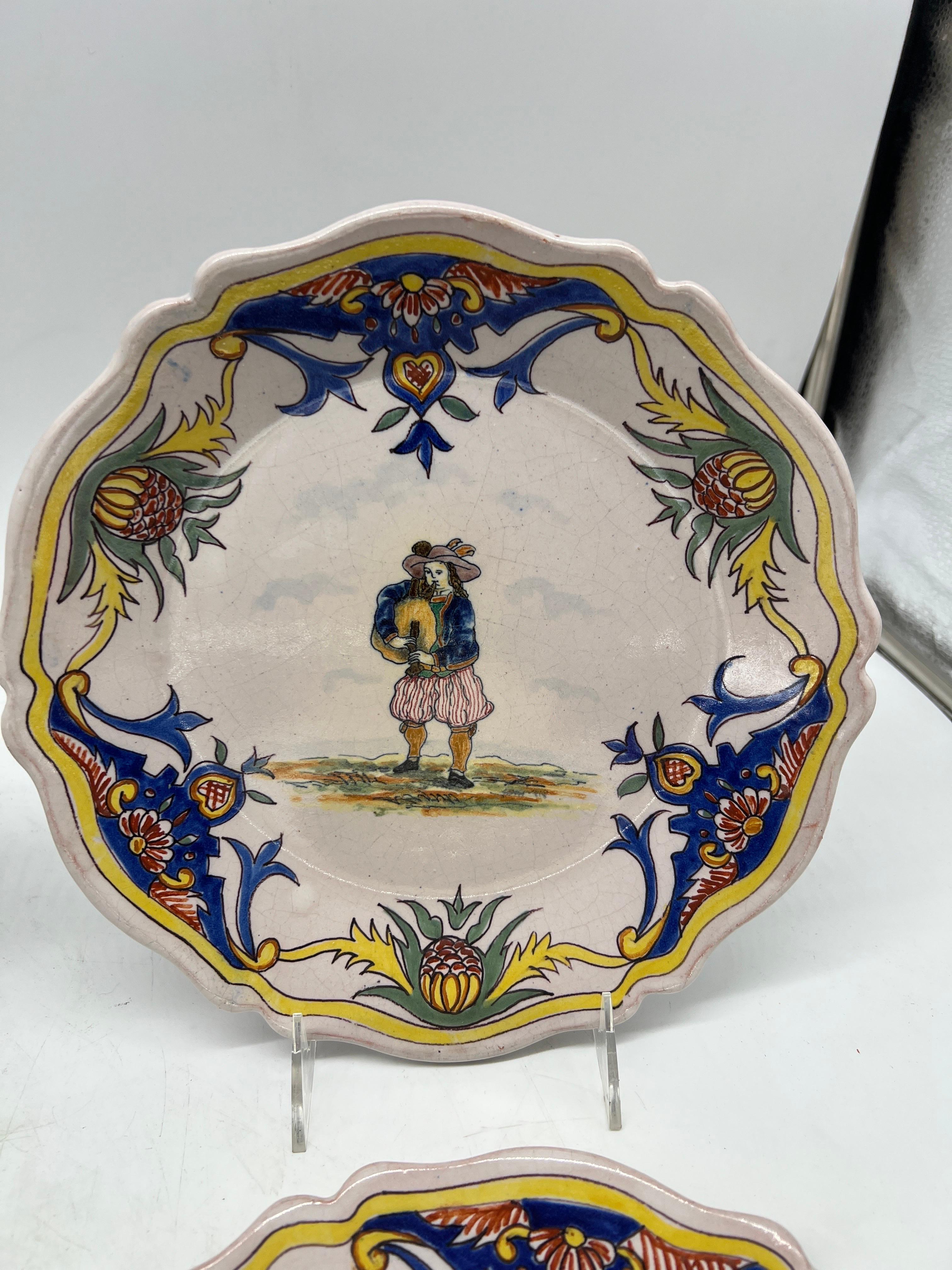 Collection of 4 French Quimper Faience Pottery Figural Plates In Good Condition For Sale In Atlanta, GA