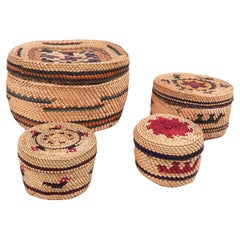 Collection of 4 Makah Lidded Baskets Duck Canoe Motif