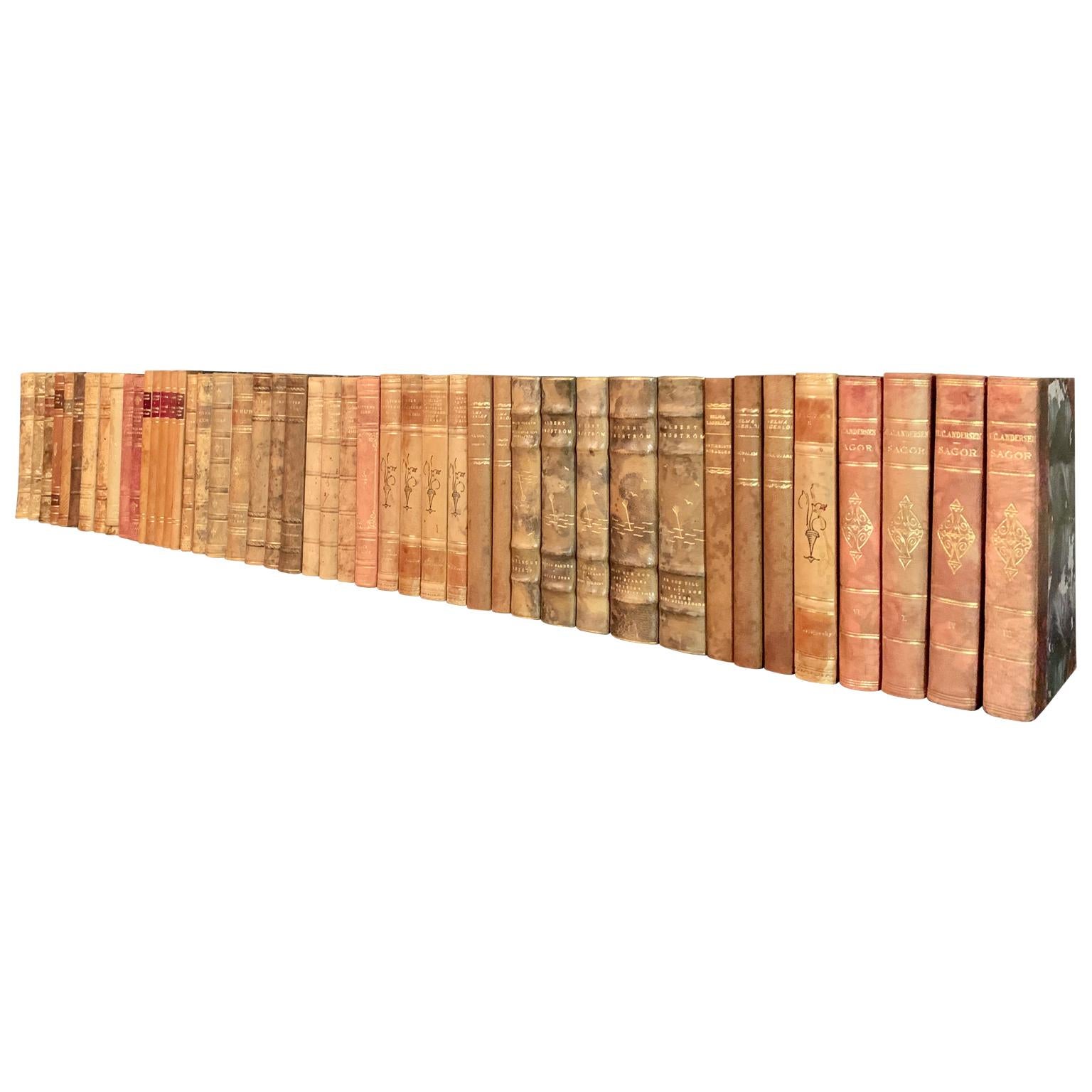 A collection of 45 Swedish decorative antique leather-bound library books

This lot of books on literature from Sweden are wrapped in beautiful vintage leather-bound covers, comprised of a selection of warm tones and gold leaf print embossing. The