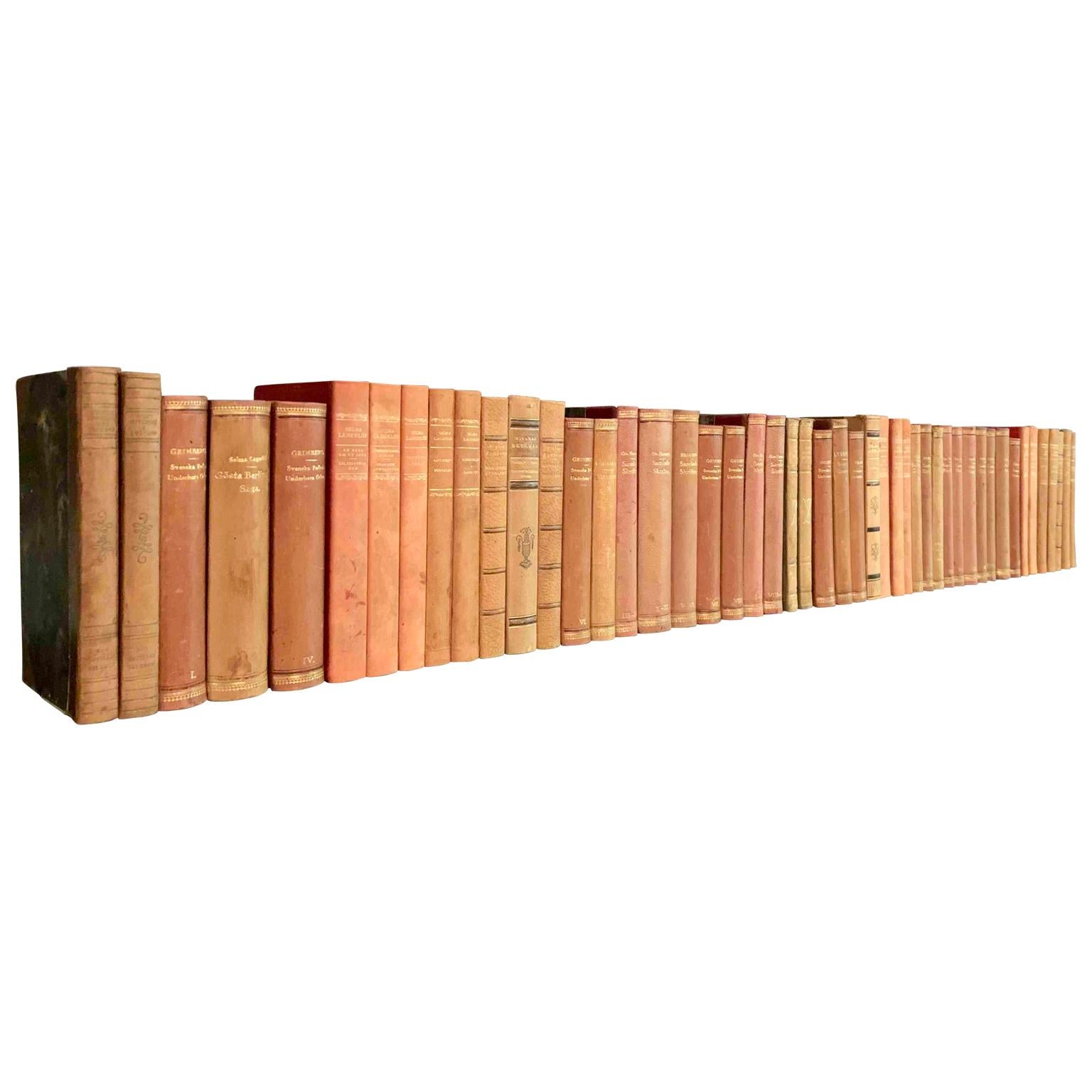 A collection of 48 Swedish decorative antique leather-bound library books

This lot of books on literature from Sweden are wrapped in beautiful vintage leather-bound covers, comprised of a selection of warm tones and gold leaf print embossing. The