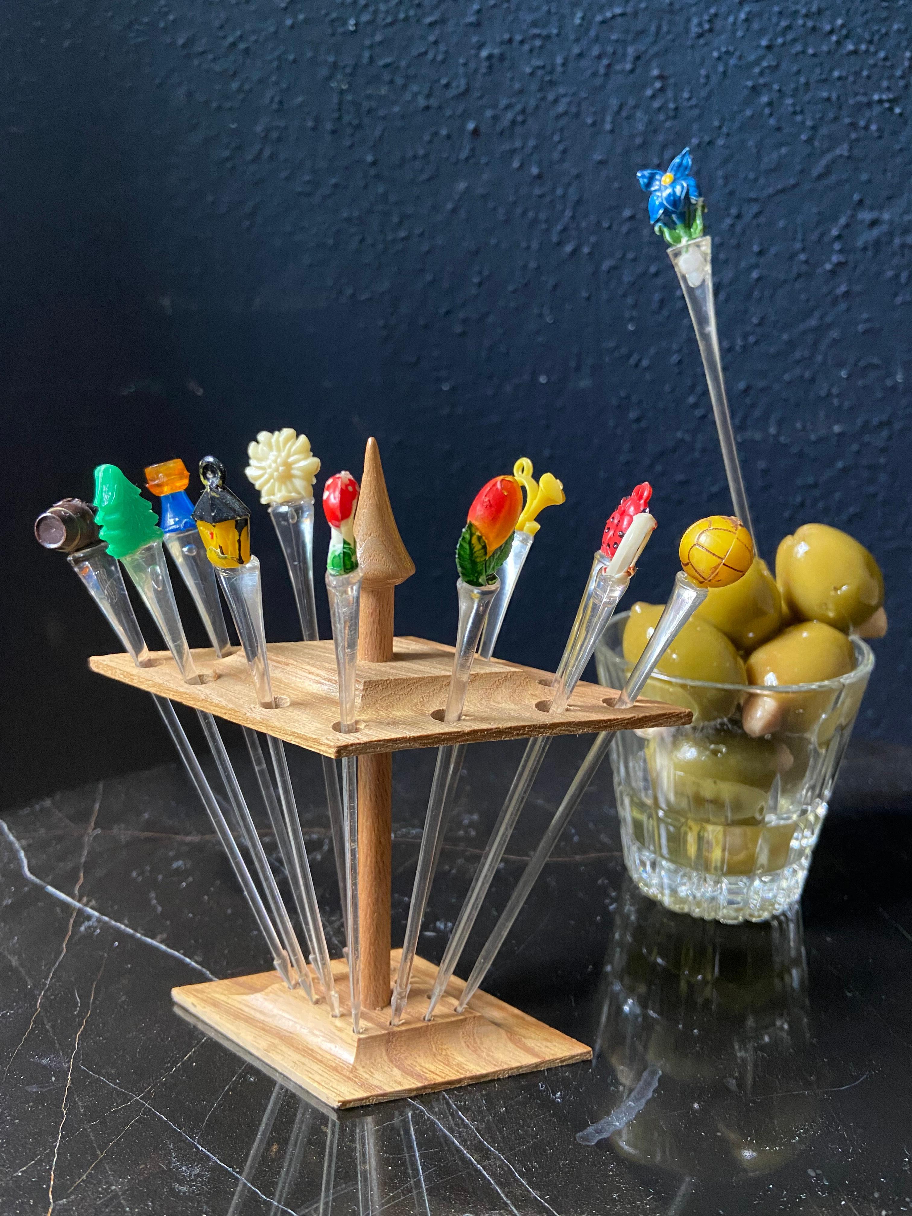 See our store for more barware!

This adorable set of 48 (!) colorful cocktail picks will bring a touch of 1970's charm to your party, whether you are hosting a sophisticated soiree offering dirty Martinis or a more casual evening with Tapas or
