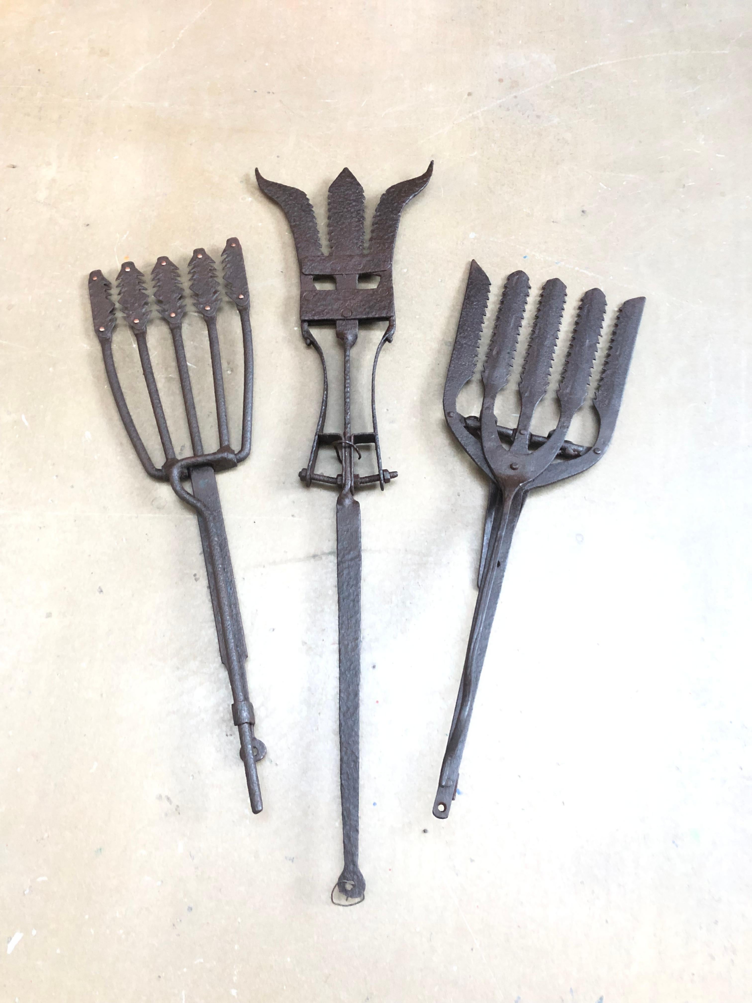 A collection of 5 wrought iron eel forks from the 18th century. 
Extremely decorative and each one unique. 
Each one is a work of art. 
Sizes vary from 65 cm to 50 cm. 
Would look amazing in a fish restaurant, bar, club or even in your home.
In 2009