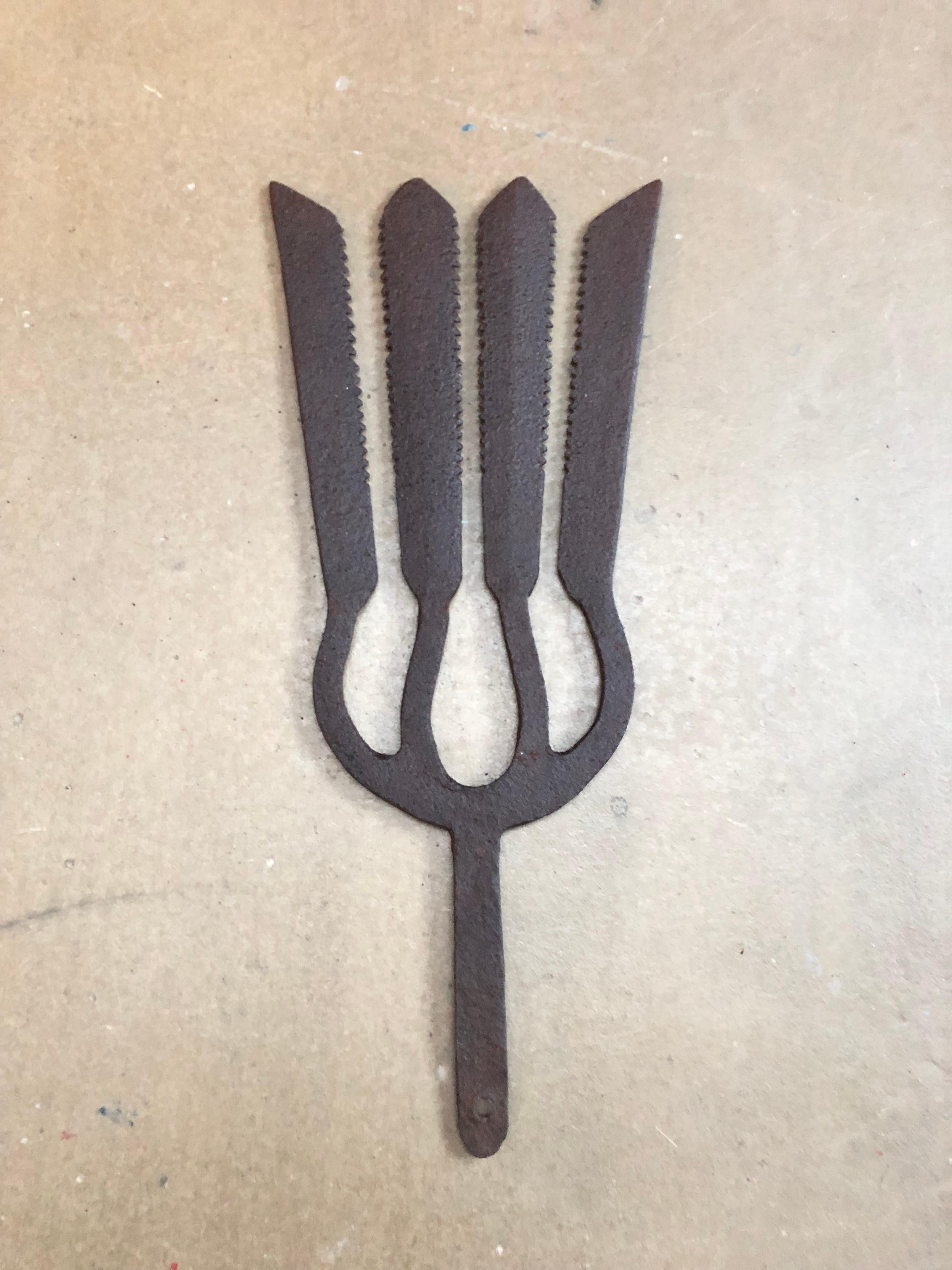 A collection of 5 wrought iron eel forks from the 18th century. 
Extremely decorative and each one unique. 
Each one is a work of art. 
Sizes vary from 37 cm to 42 cm. 
Would look amazing in a fish restaurant, bar, club or even in your home.
In 2009