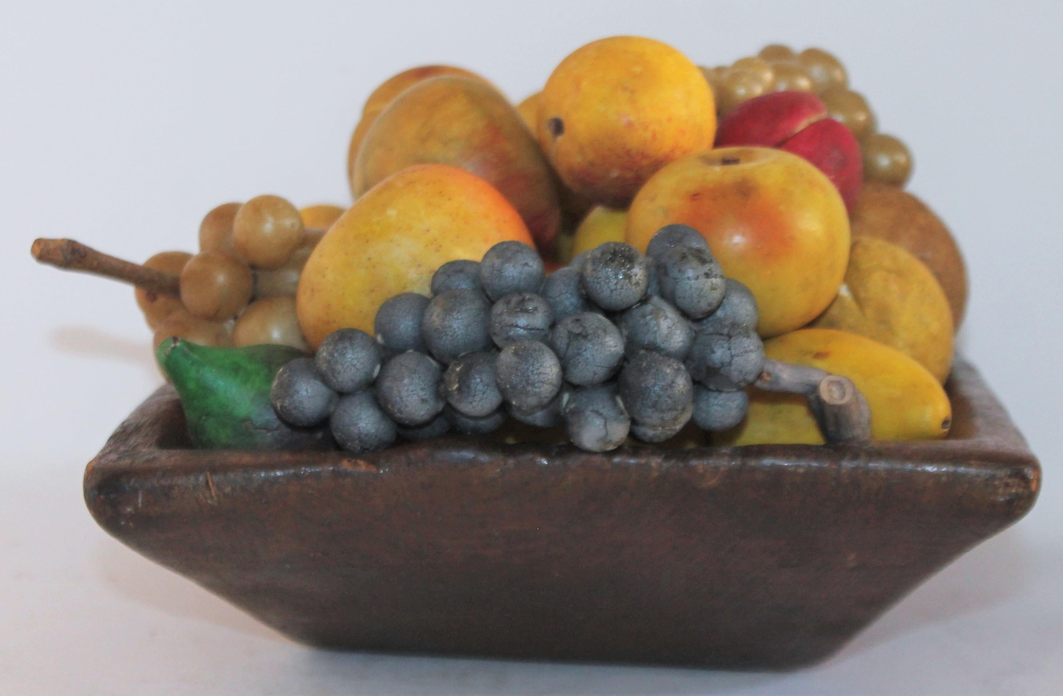 Collection of 50 Pieces of Stone Fruit in 19th Century Hand Carved Bowl 1