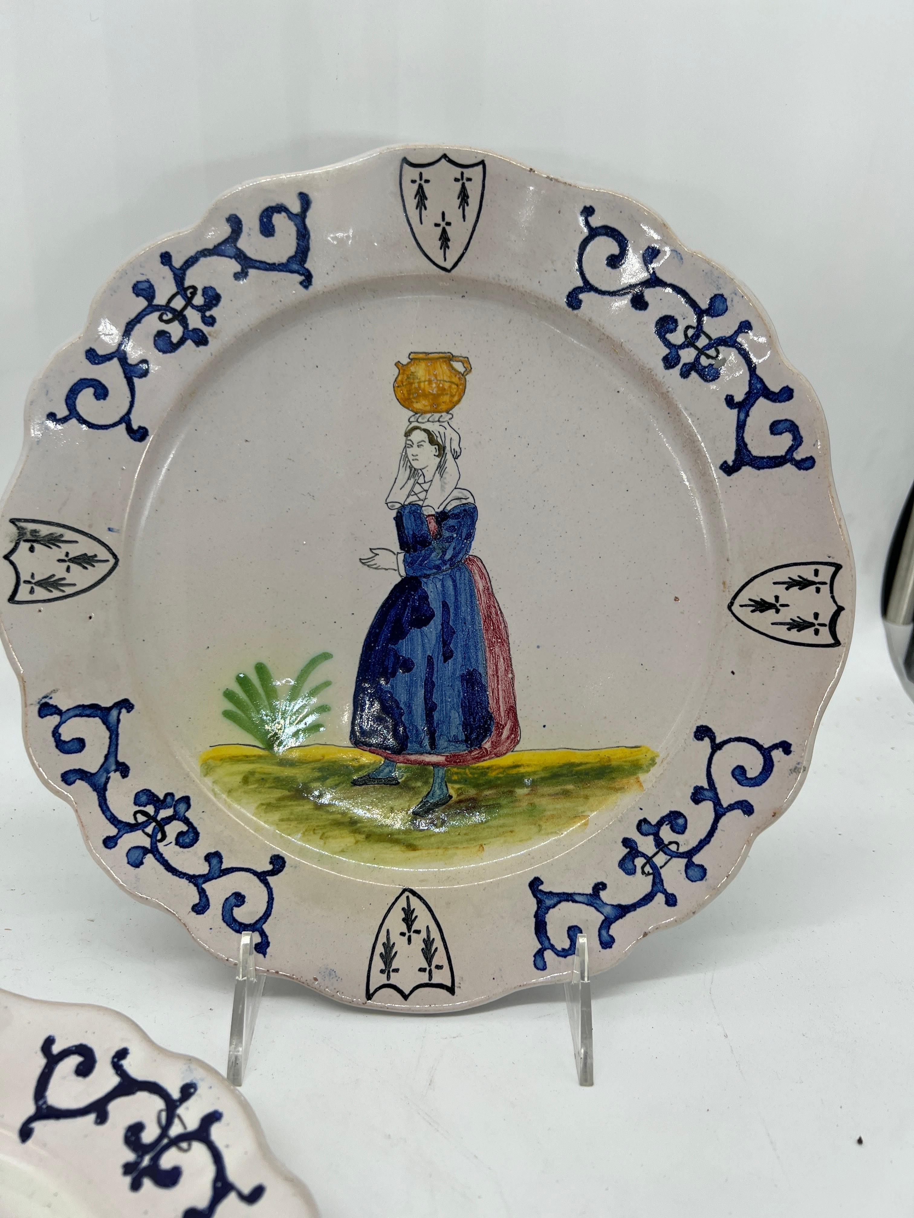 20th Century Collection of 6 French Quimper Faience Pottery Figural Shield Armorial Plates For Sale