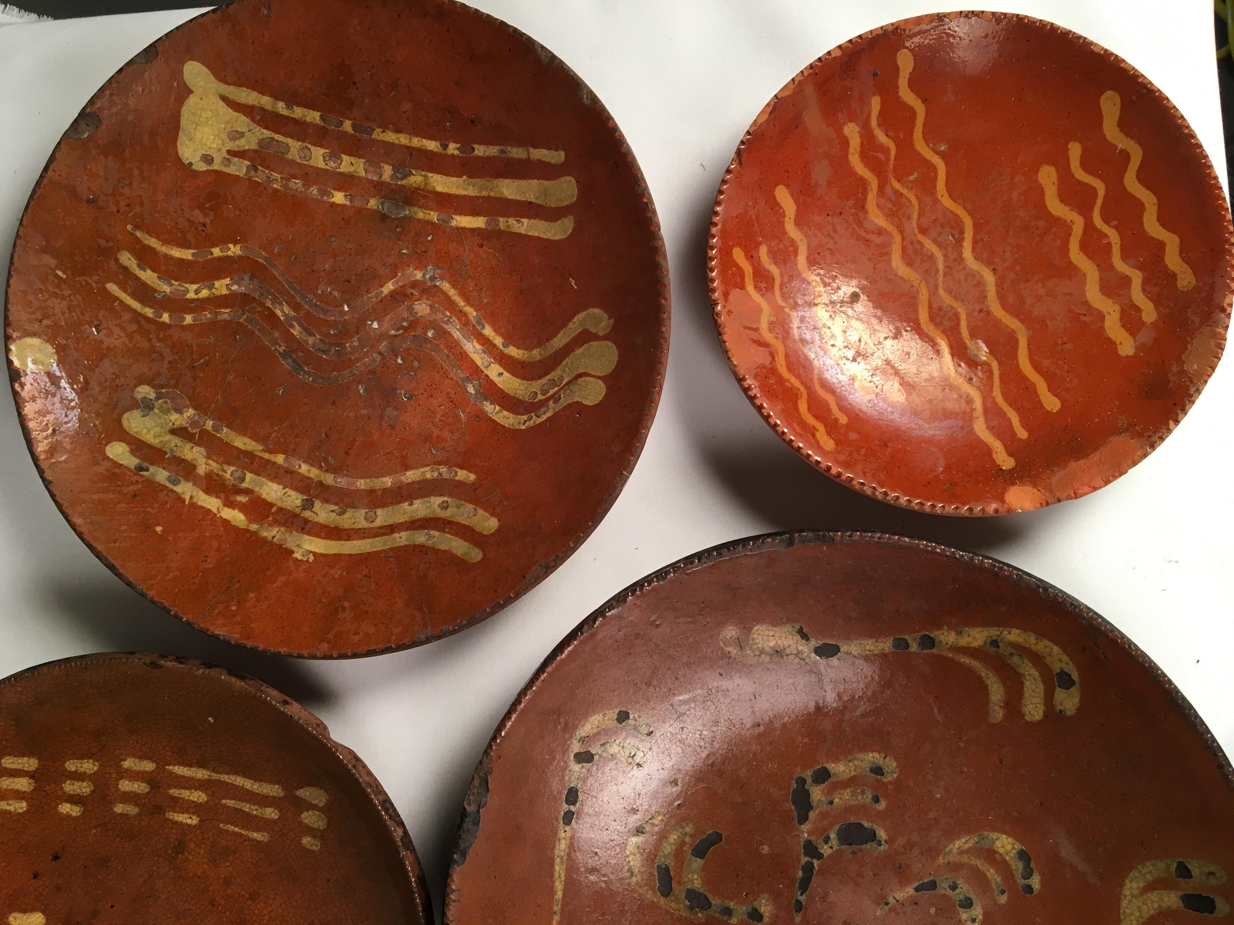 Primitive Collection of 6 Pennsylvania Redware Plates, 19th Century
