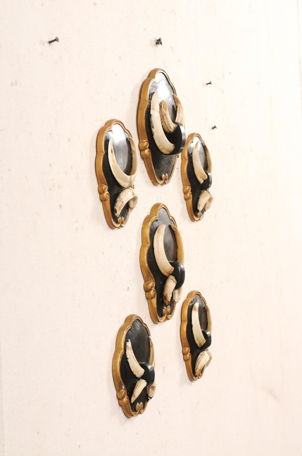Hand-Carved Collection of 6 Wall Plaques w/Boar Tusks For Sale