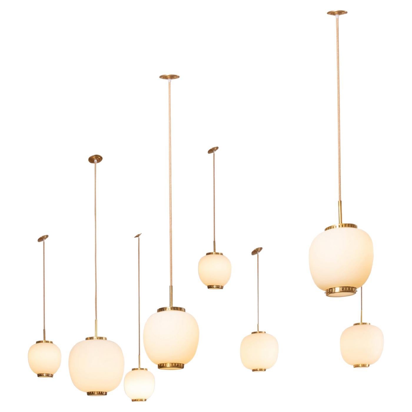 Collection of 9 Opaline Glass and Brass Ceiling Fixtures, Bent Karlby for Lyfa