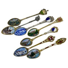 Collection of 7 Silver and Enamel Spoons from Various Places in Europe