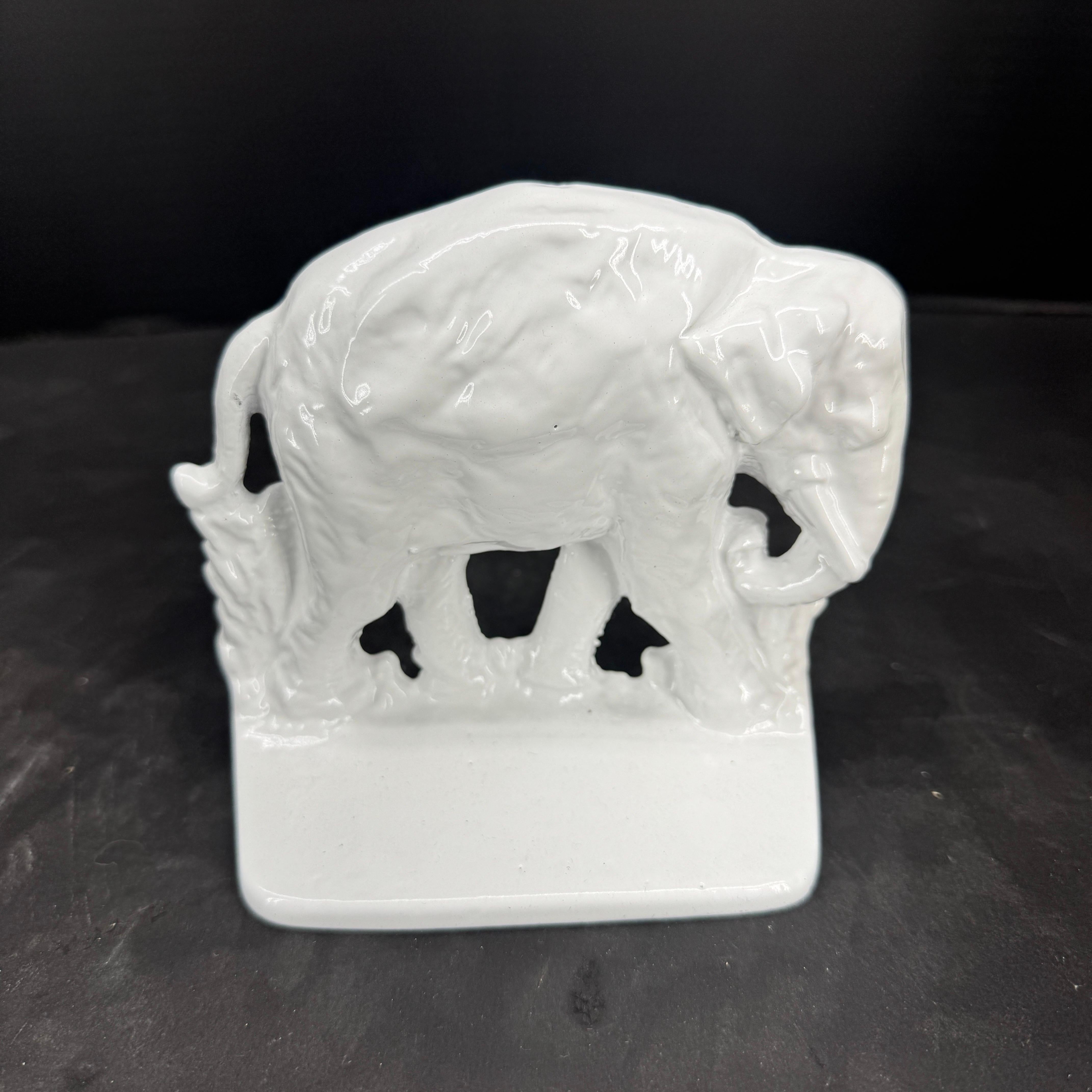 Hand-Crafted Collection of 7 White Powder Coated Cast Iron Bookends For Sale