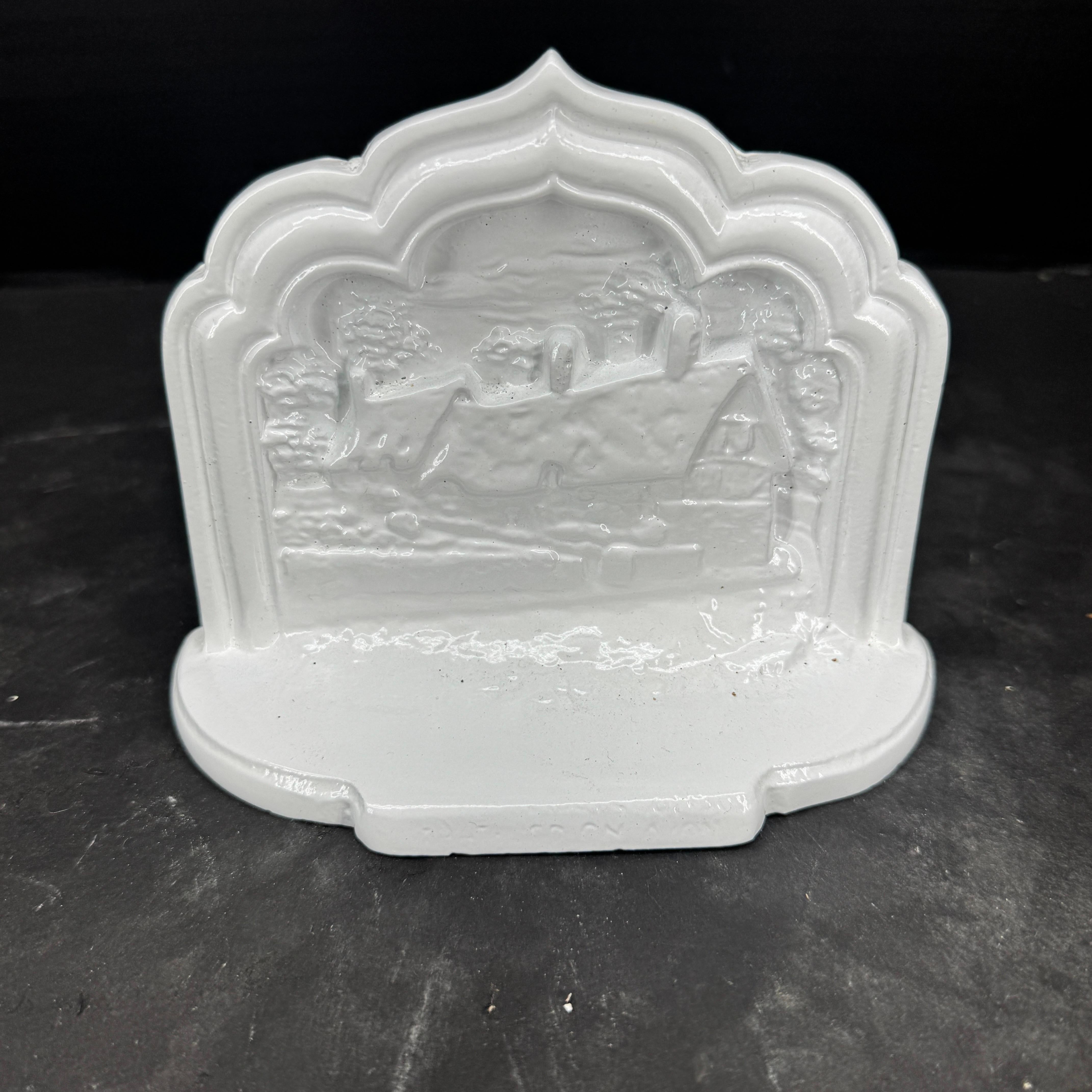 Collection of 7 White Powder Coated Cast Iron Bookends For Sale 1