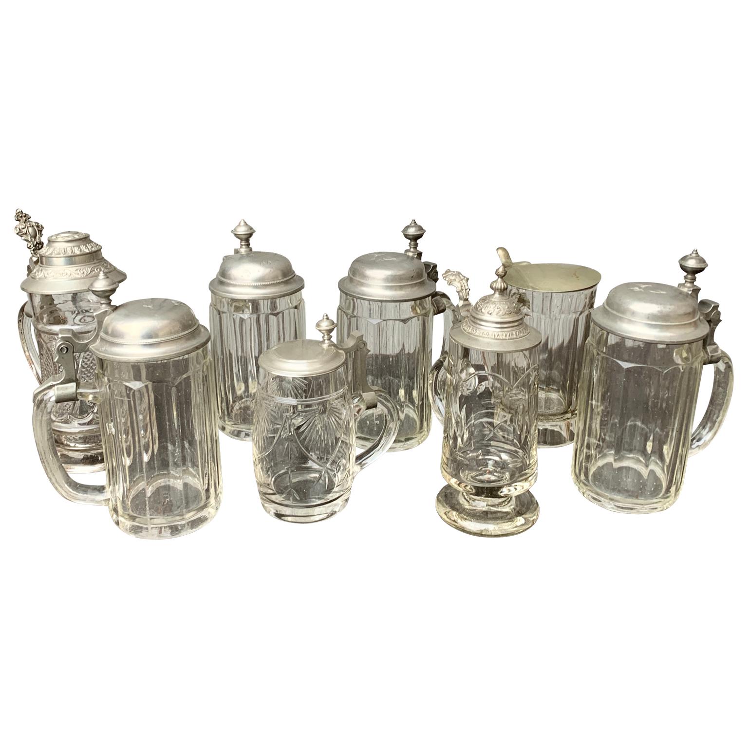 Hand-Crafted Collection of 8 Glass And Metal German Tankards For Sale