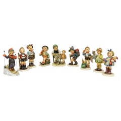 Collection of 9 figurines of M.I. Hummel, Goebel West Germany