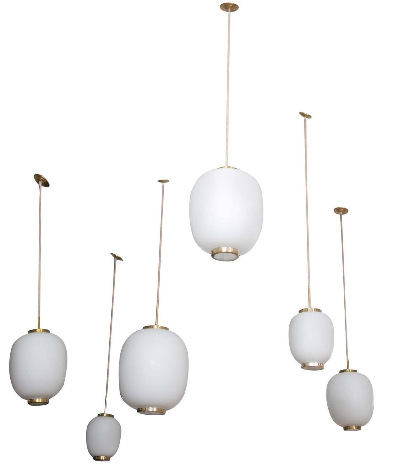 Mid-20th Century Collection of 9 Opaline Glass and Brass Ceiling Fixtures, Bent Karlby for Lyfa