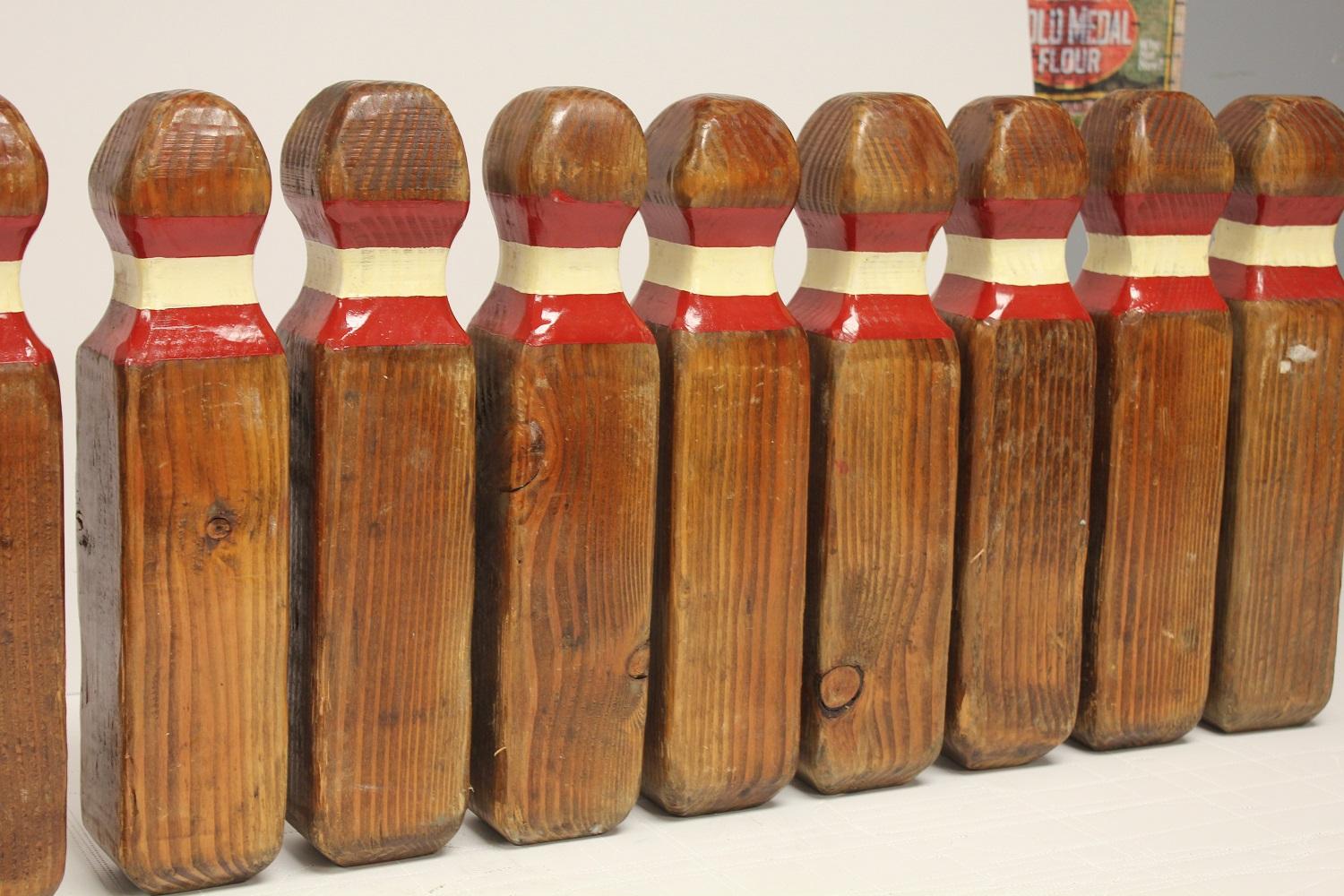 Folk Art Collection of 9 Vintage Lawn Bowling Pins For Sale