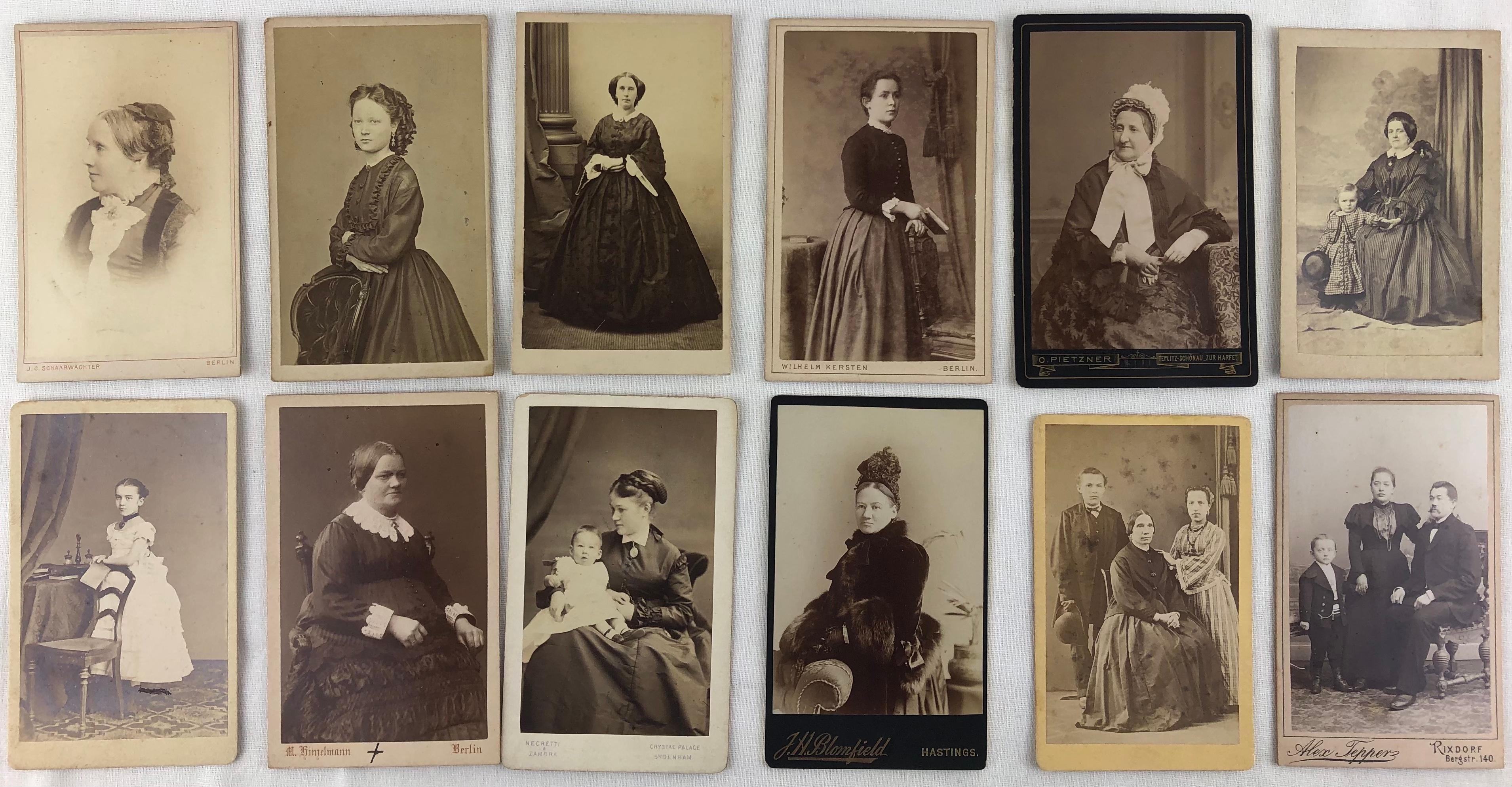 Collection of antique black and white ancestral photographs from Germany and perhaps Switzerland (Suisse/Allemagne) discovered inside an Alfonse Mucha Art Nouveau photo album. Some photos have markings on the back written in both the French and