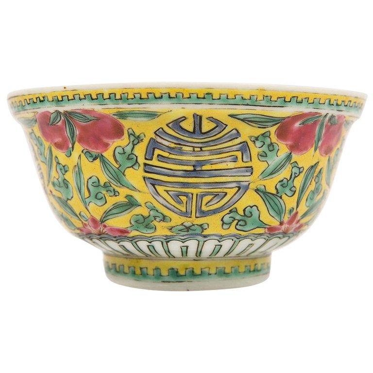 Each piece in this group of Chinese porcelain is delightfully colorful with interesting symbolism and details.
1) An exquisite Chinese porcelain hunt bowl painted in Famille Rose over-glaze enamels. The strong color palette and rich decoration are