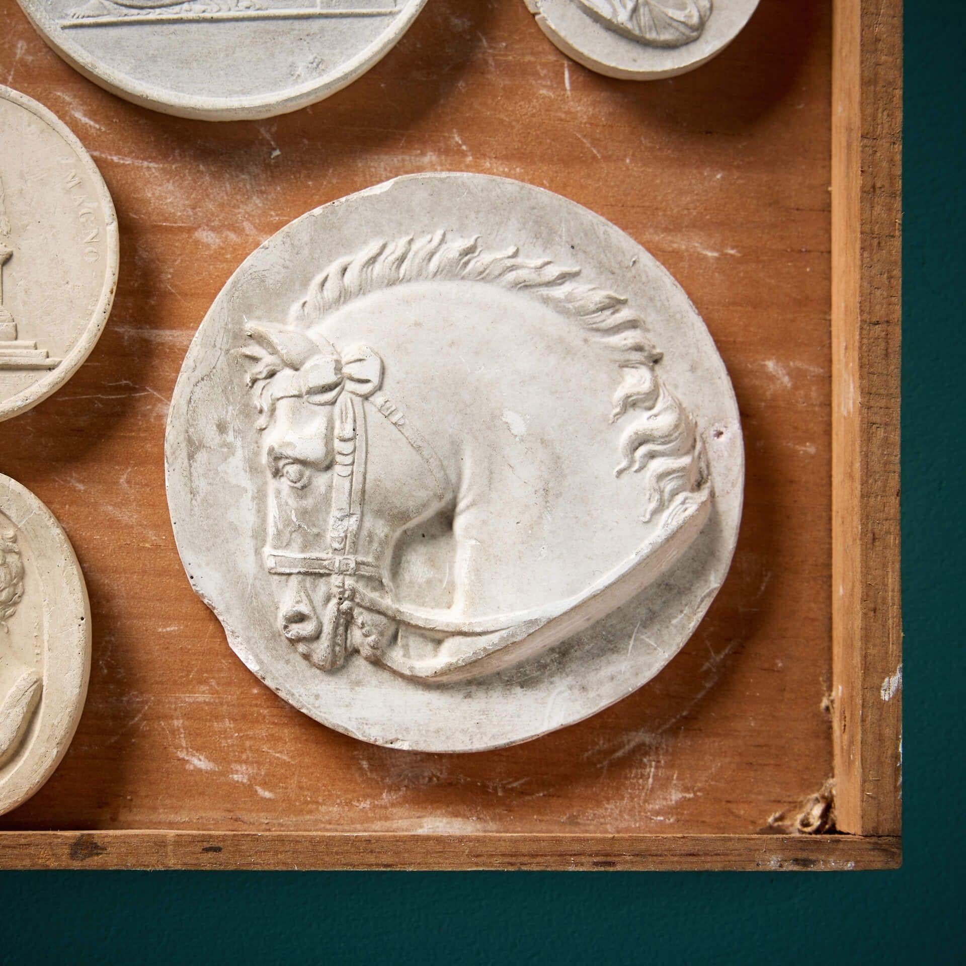 19th Century Collection of Antique Neoclassical Plaster Cameos For Sale