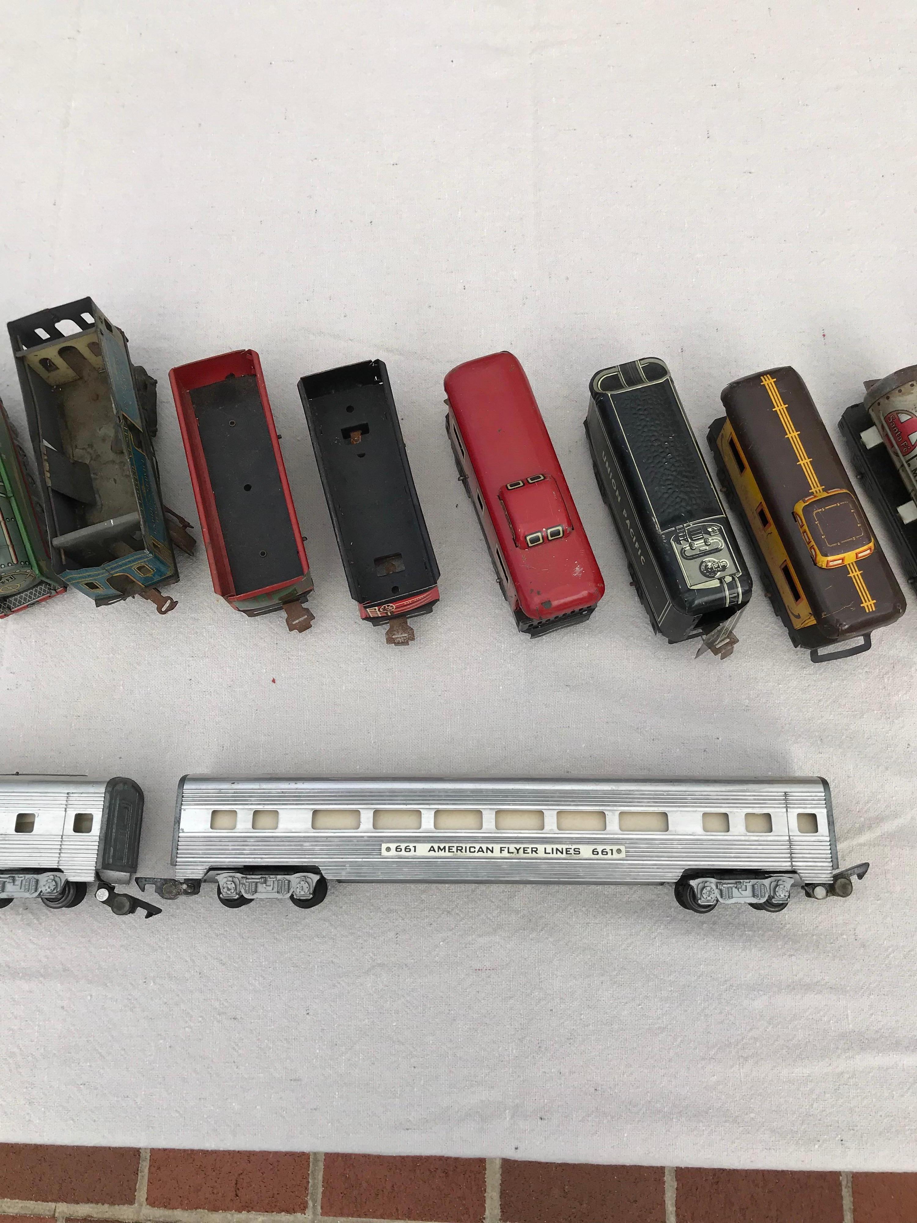 Collection of antique trains. It includes two 1950s American Flyer streamline aluminum trains. One engine and one pull car. Some are Lionel Trains and some are by Marx. We can send more detailed photos if interested. Great gift of 15 trains for that