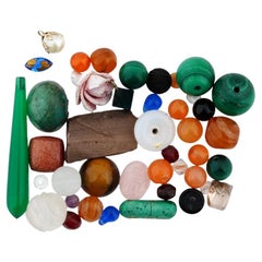 Collection Of Assorted Carved Glass Stones Beads