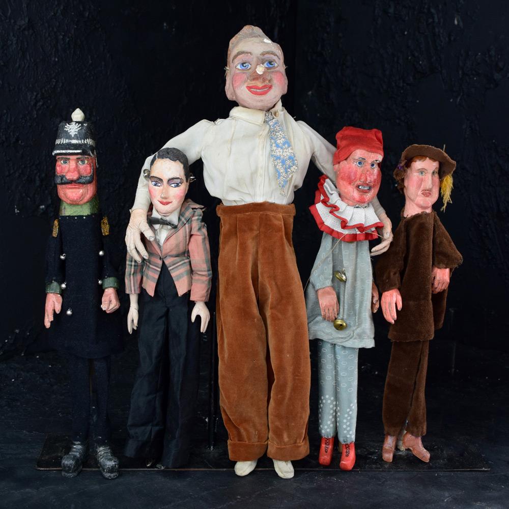 Collection of early 20th Century hand-crafted puppets 

We share what we love, and we love this collection of early to mid-20th Century hand carved/crafted puppets. Made from pine with charming, detailed hands and boots. Great expressions on each