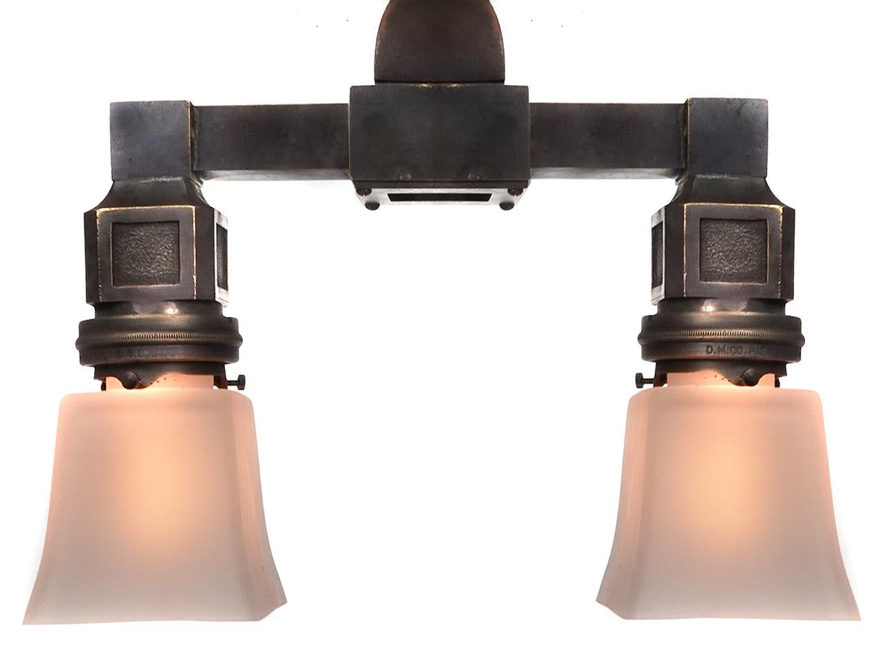 Collection of Early NYC Bronze Double Subway Double Pendents For Sale 1
