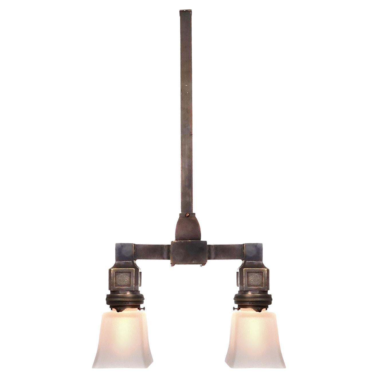 Collection of Early NYC Bronze Double Subway Double Pendents For Sale