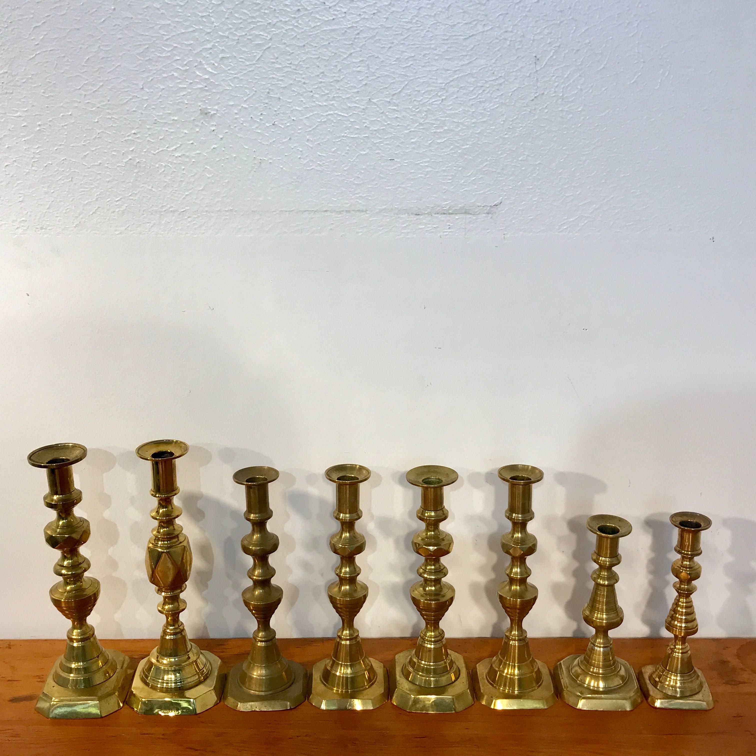 High Victorian Collection of Eight Antique English Brass Candlesticks