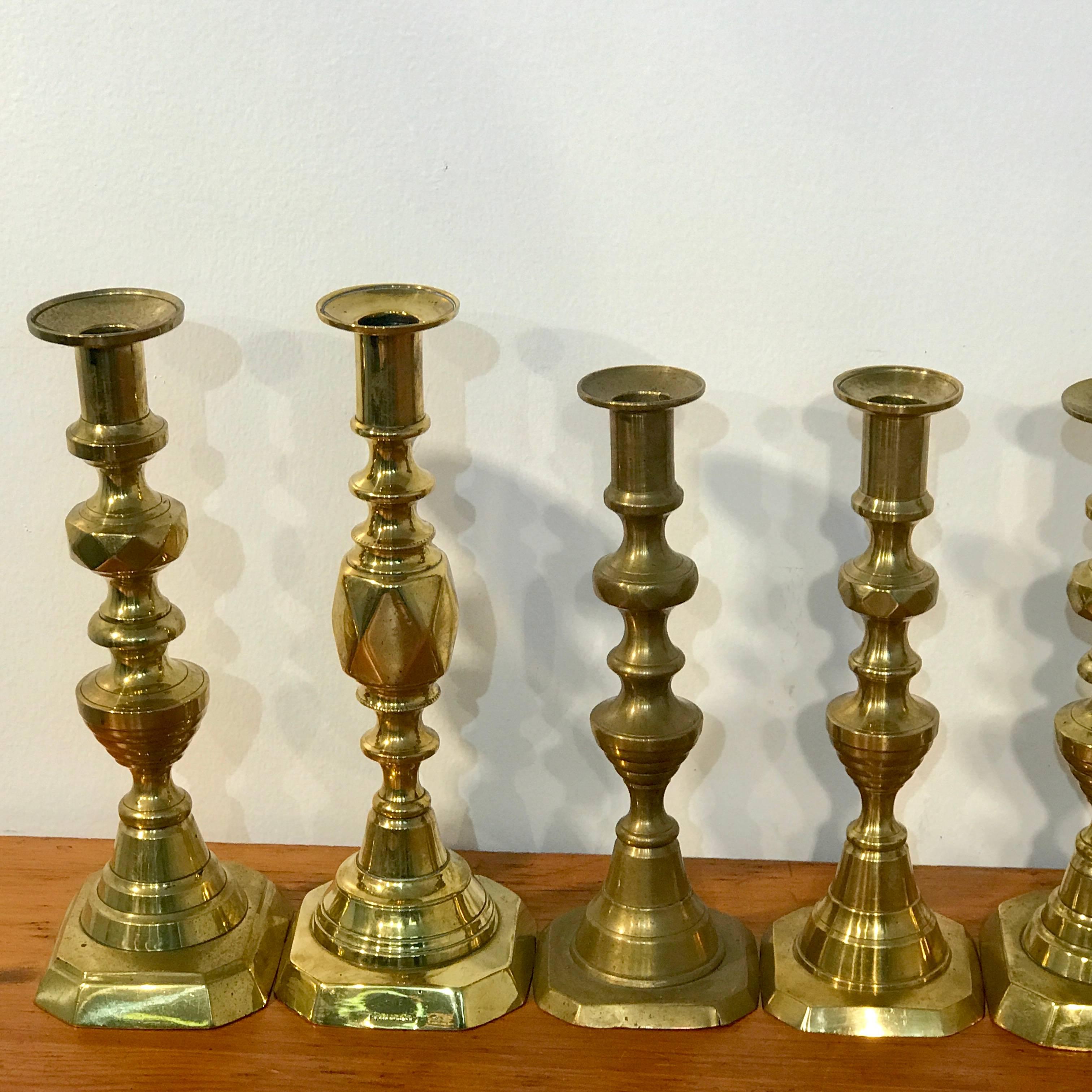 Collection of Eight Antique English Brass Candlesticks In Distressed Condition In West Palm Beach, FL