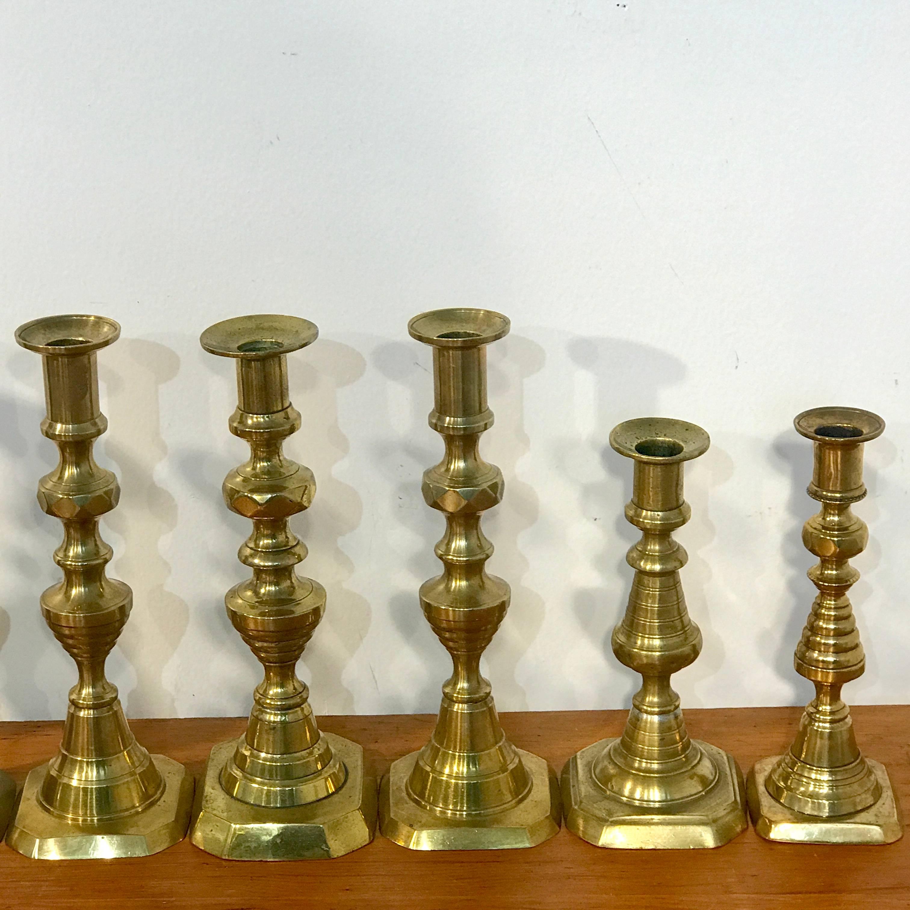 19th Century Collection of Eight Antique English Brass Candlesticks