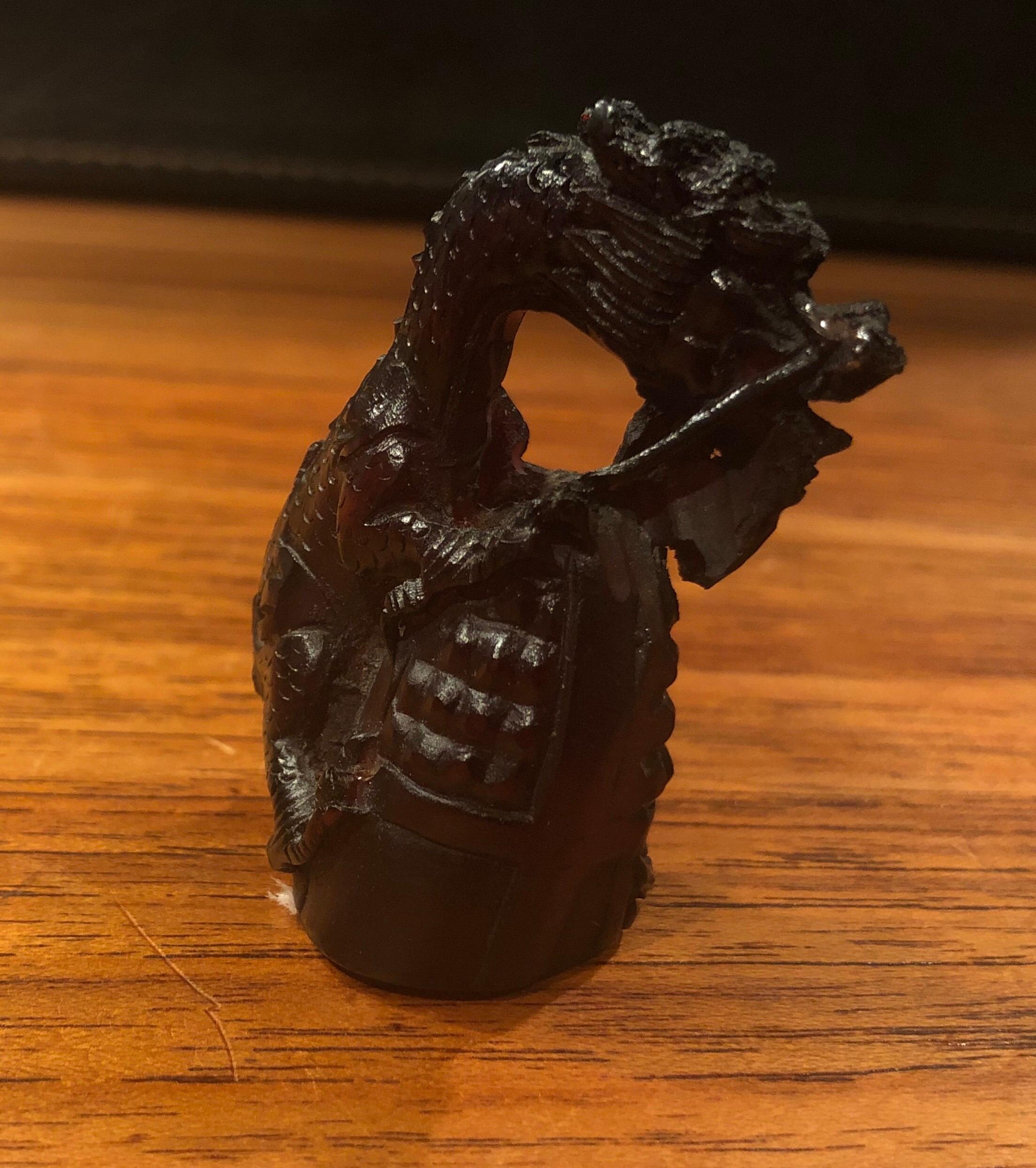 Collection of Eight Japanese Amber / Resin / Bakelite Netsukes For Sale 10