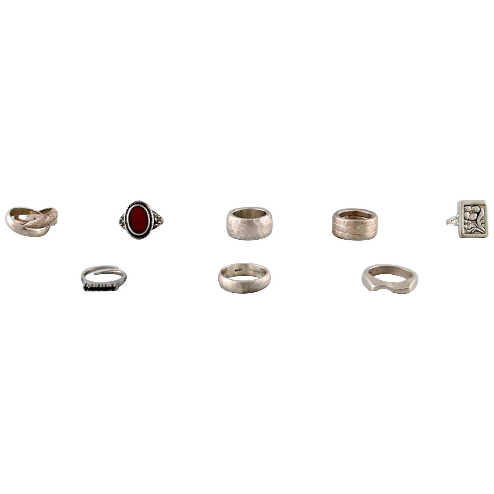 Collection of Eight Modern Stamped Silver Rings For Sale