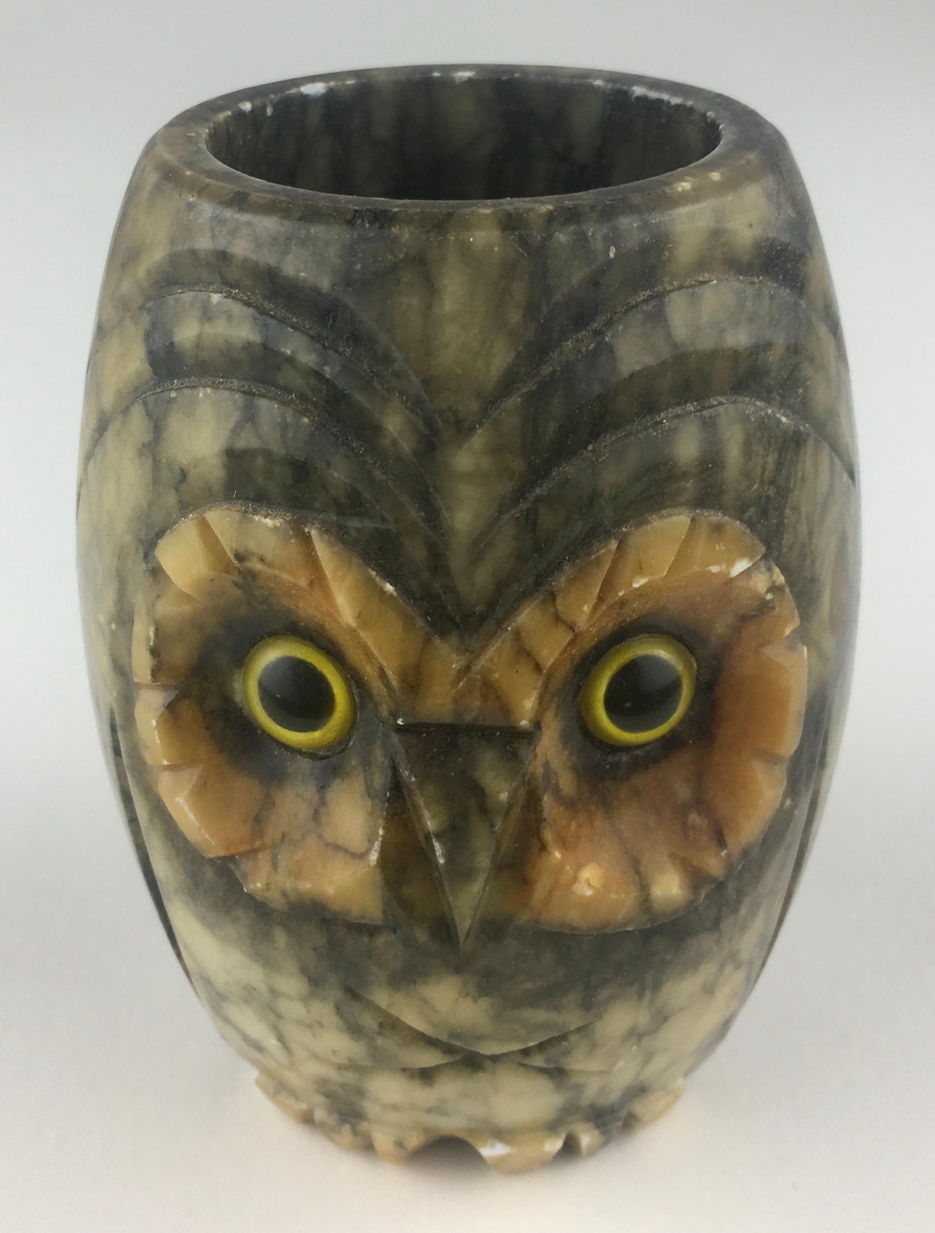 Adorable collection of eight owl sculptures, in a variation of materials: 
2 sculpted from marble, 2 wood, 4 others appear to be ceramic, etc...

The largest marble owl would make an very nice pencil holder in a child's room. 

Various sizes largest