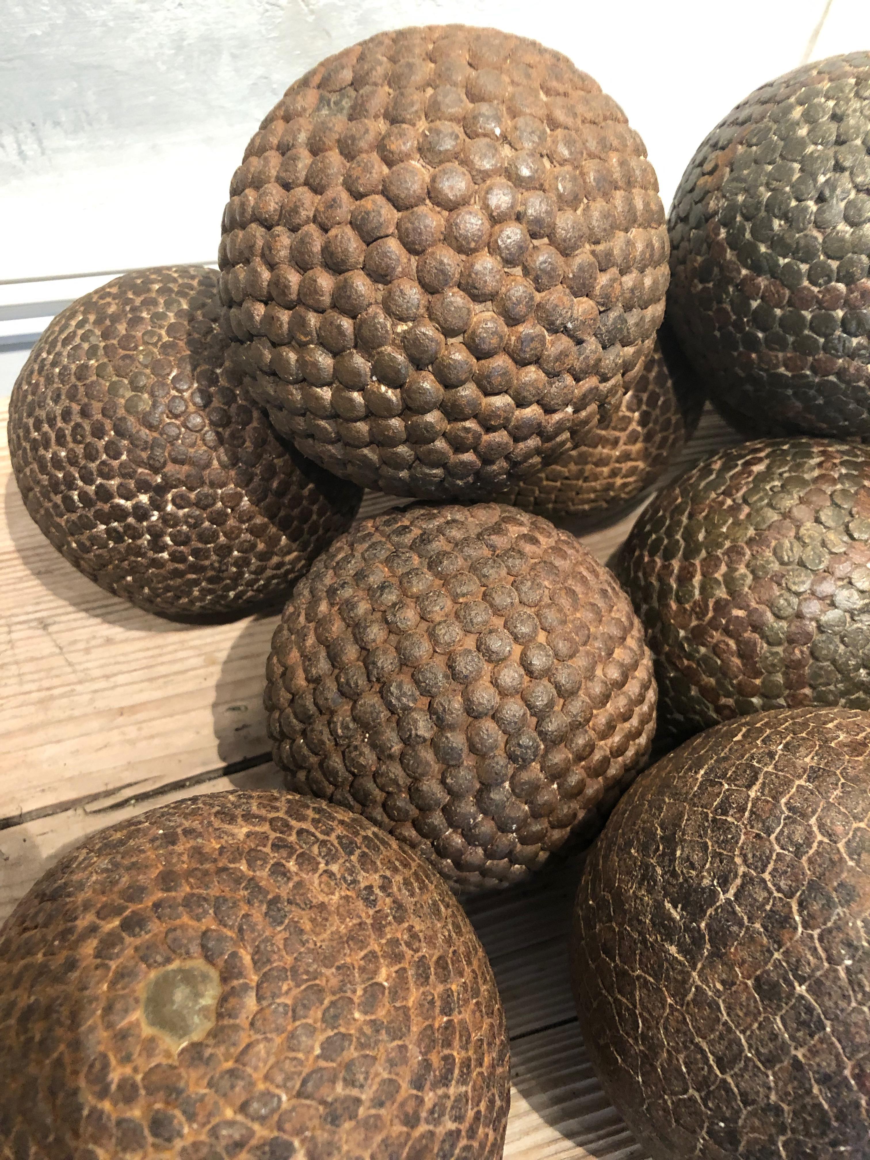 Hand-Carved Collection of Eleven 19th Century French Iron-Studded Wooden Pétanque Balls