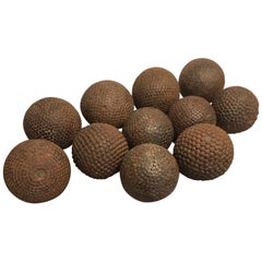 Used Collection of Eleven 19th Century French Iron-Studded Wooden Pétanque Balls