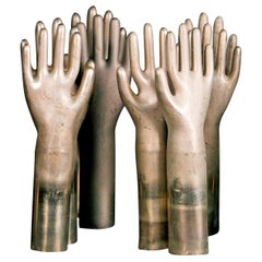 Collection of Six Aluminum Glove Molds